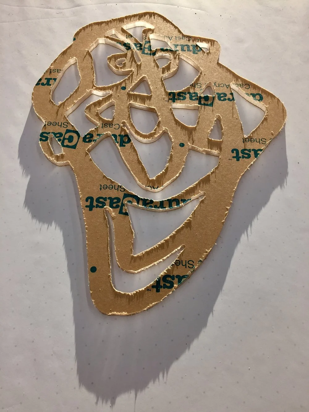 One flow face drawing cut into 3/8" thick plexiglass. 16" x 21" 