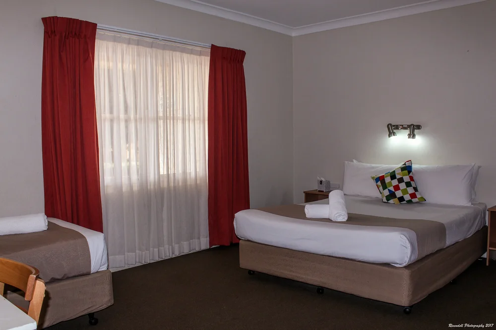 Queen and 3 Singles Family Room