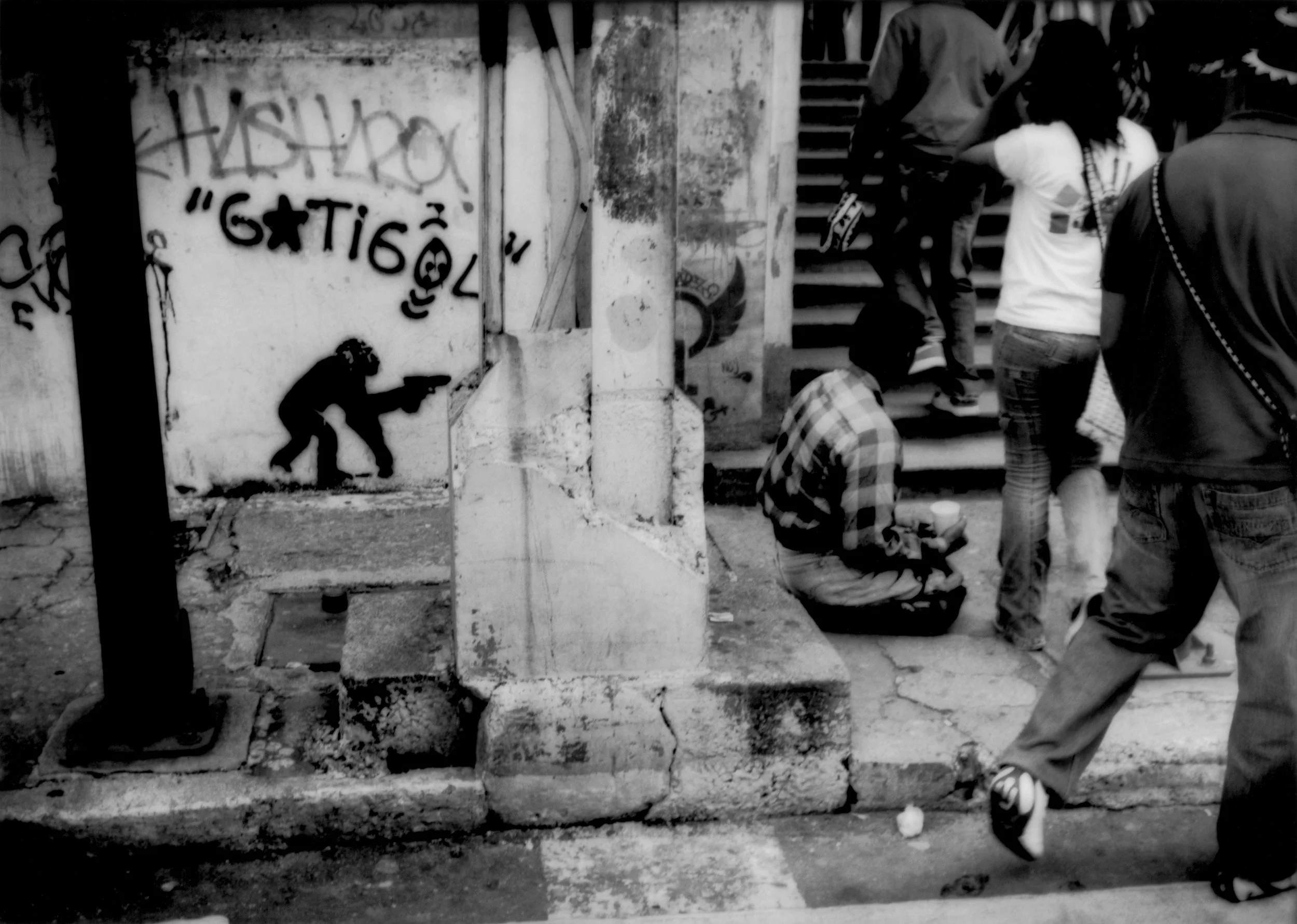 Handicapped man begs for change on the mean streets of Guatemala City, Guatemala. 2008