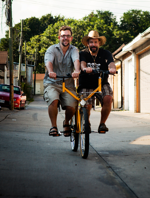 Bicyle artist Yawd Sylvester (right) and friend
