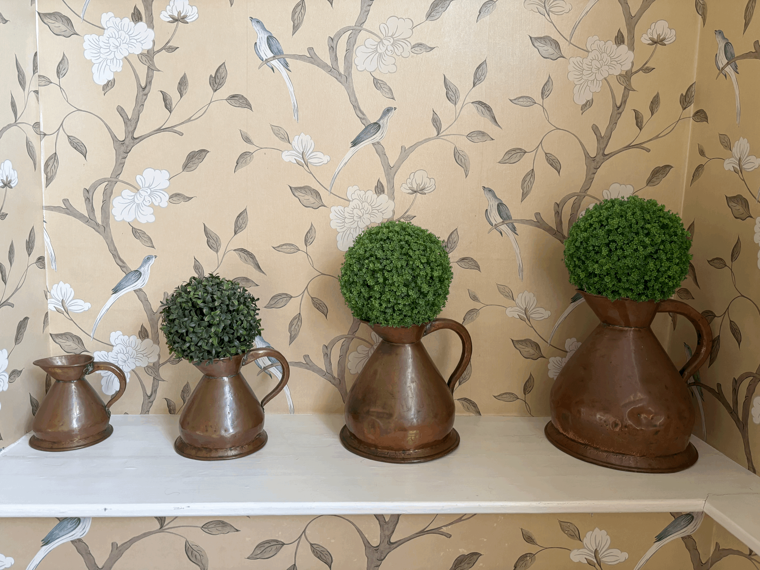 set of antique copper measure jugs