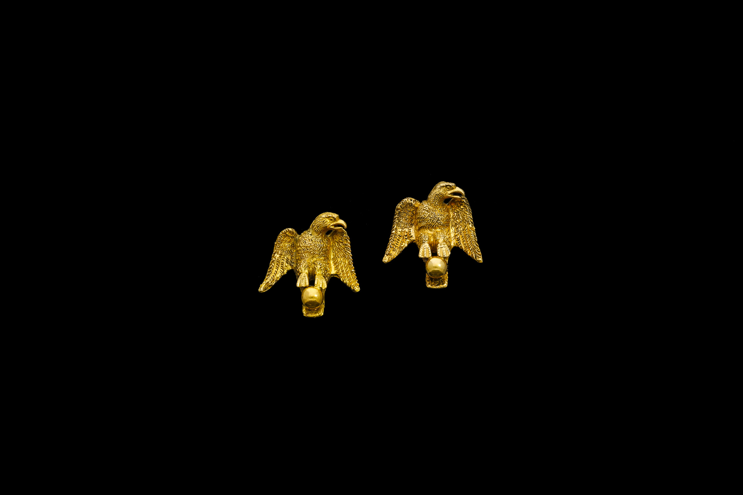 A pair of Victorian 15ct yellow gold hand tooled eagles perched on a ball earrings | £1260