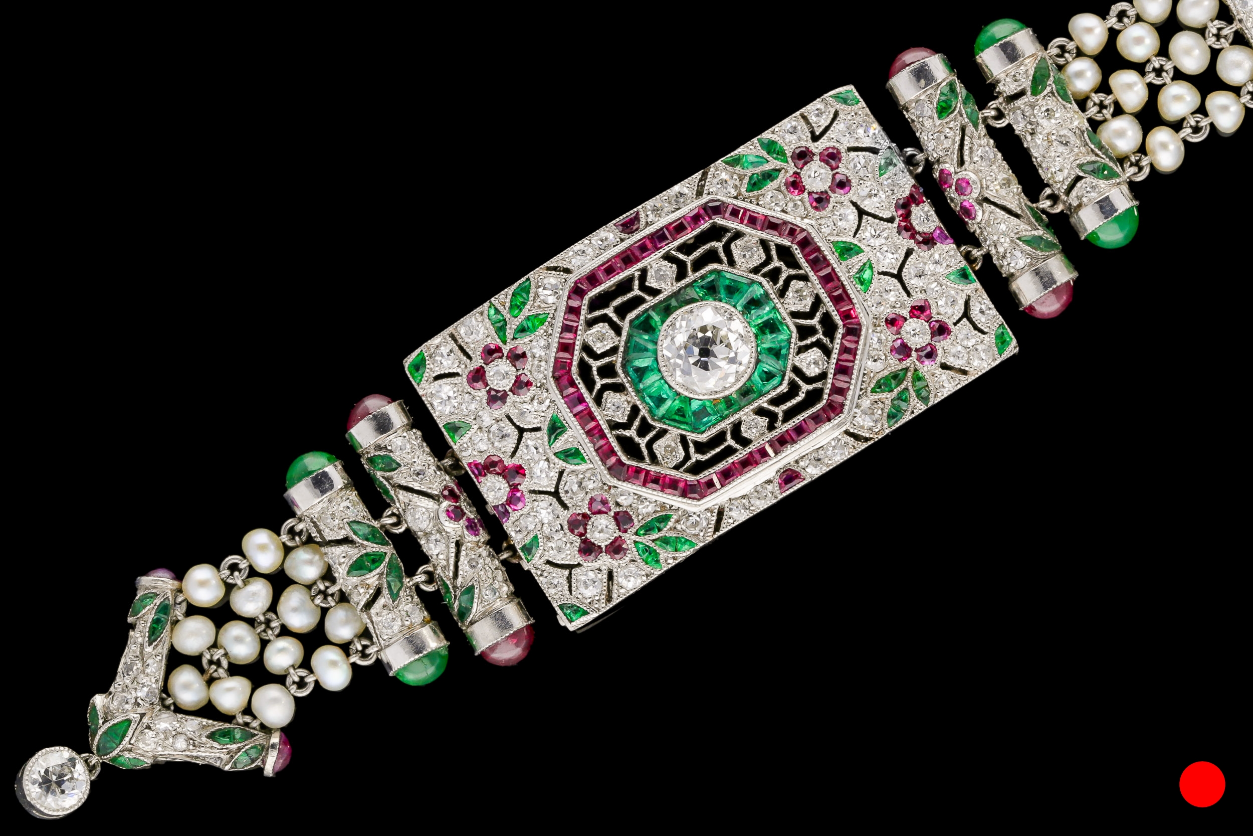 An exceptional Art Deco diamond, ruby, emerald and seed pearl necklace set | £9900