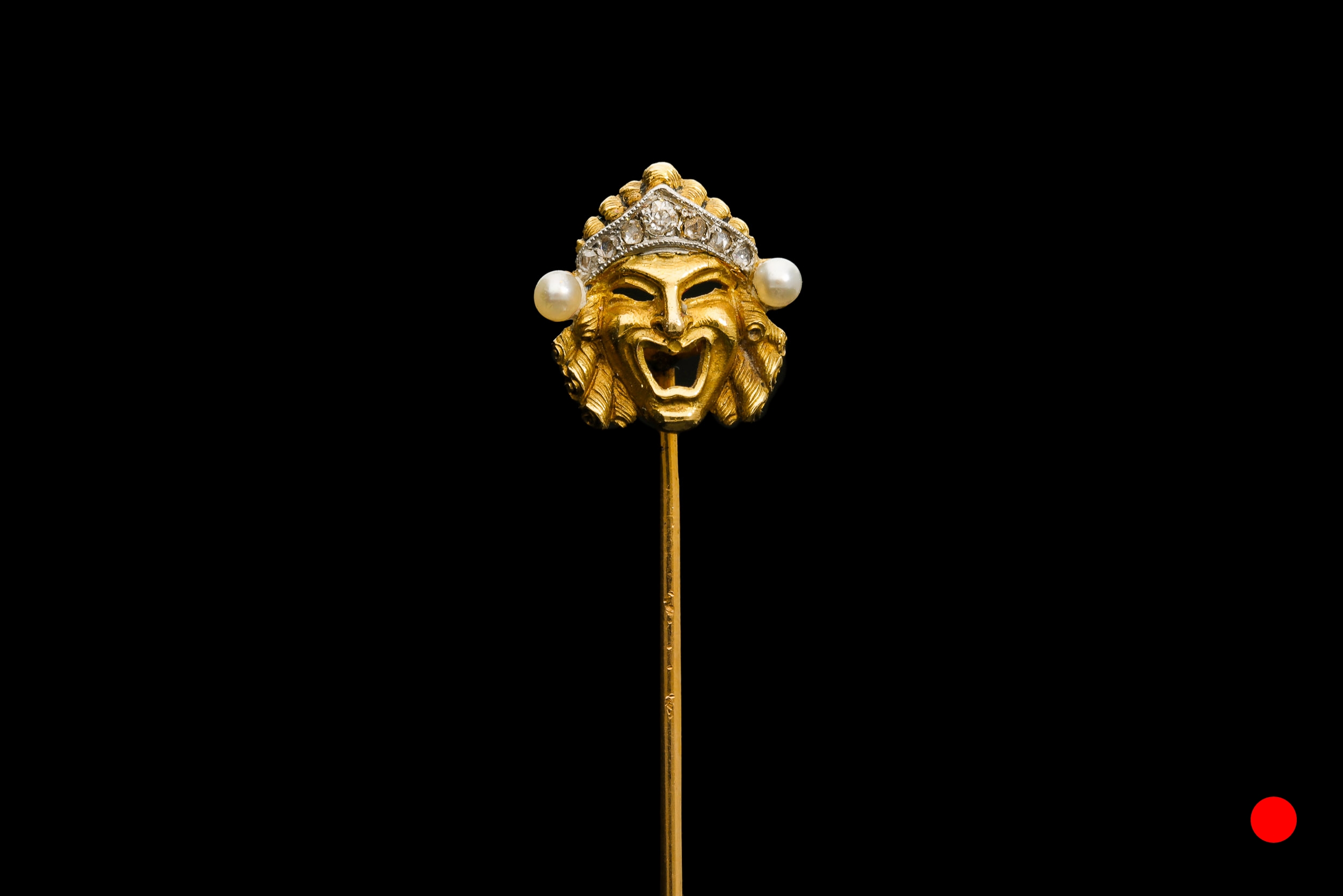 A Edwardian Greek comedy mask pin | £1650