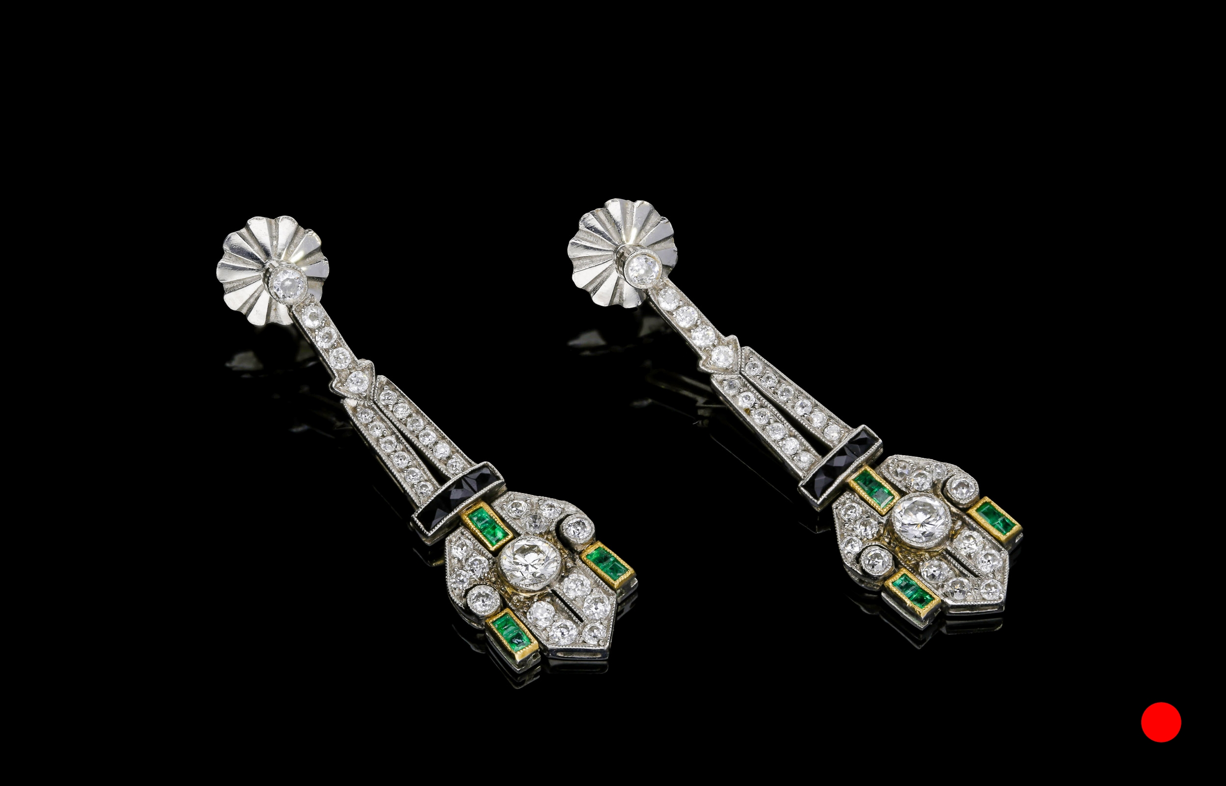 An exquisite pair of Art Deco emerald, onyx and diamond drop earrings set | £14500