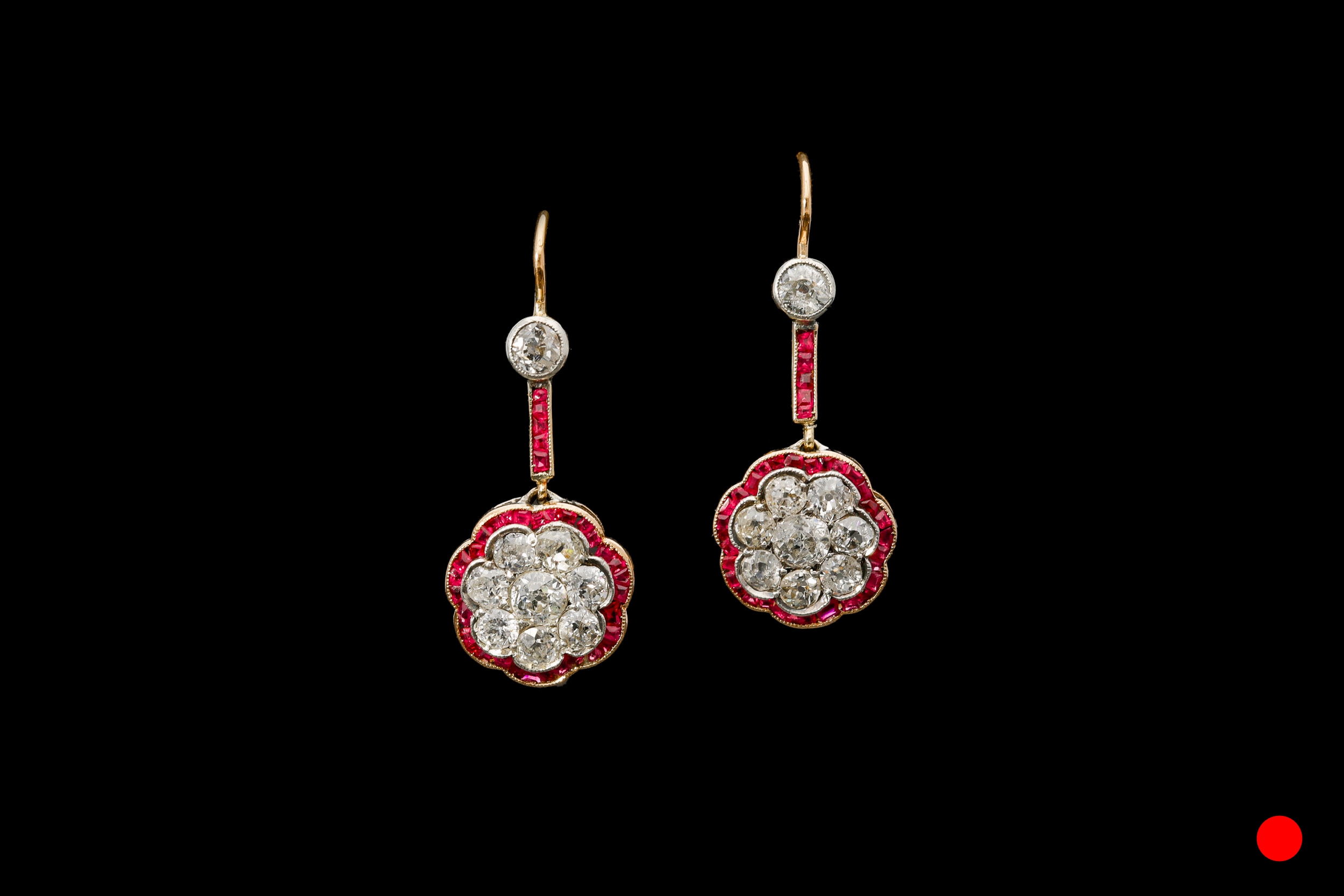 A pair of late Art Nouveau ruby and diamond floral drop earrings set | £8650