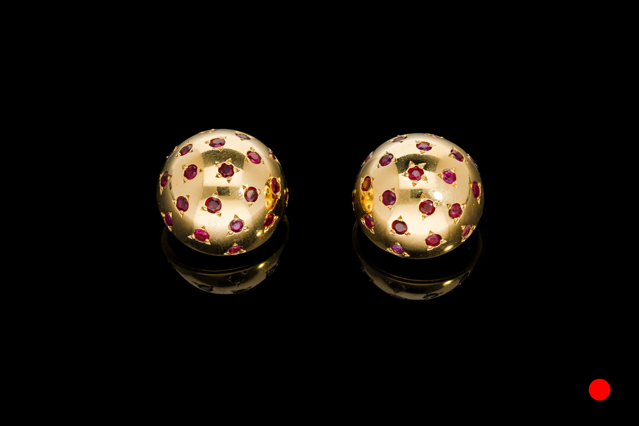 A stunning pair of French Van Cleef & Arples ruby polka dot ear clips | £6250