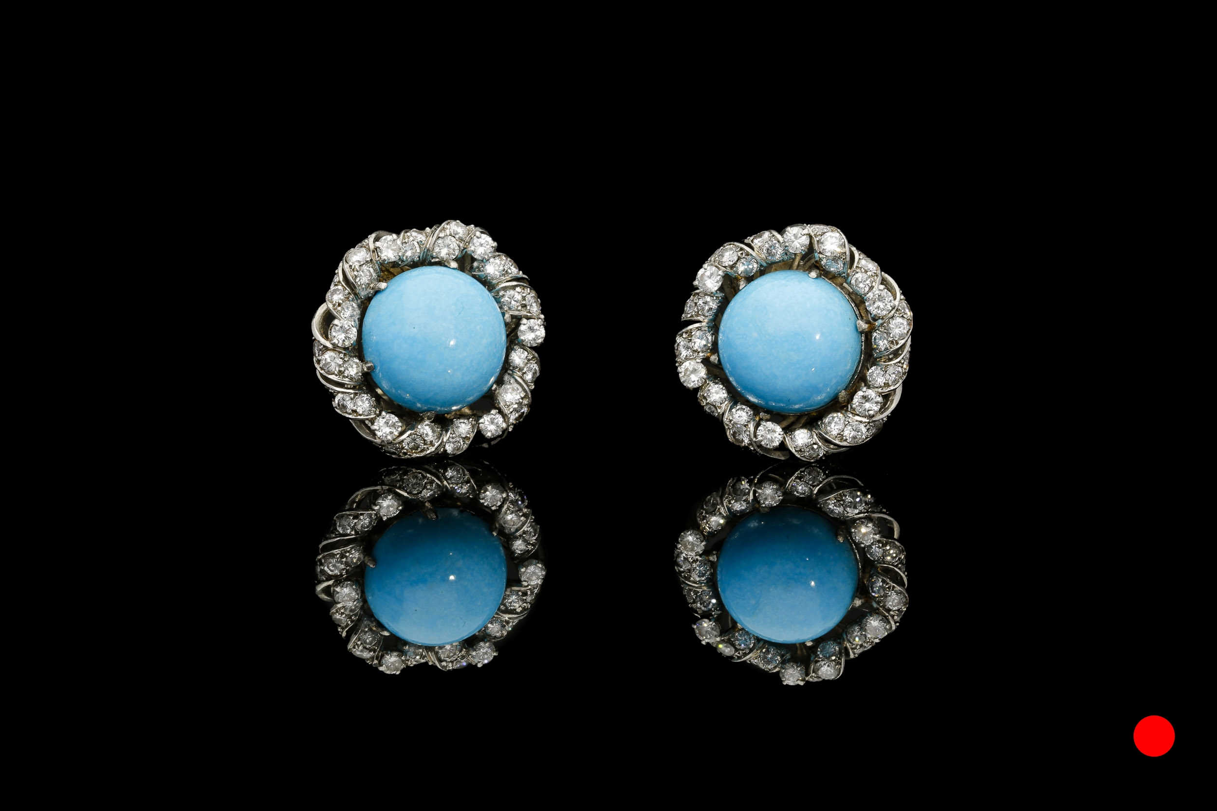 A vibrant pair of 1940's turquoise and diamond clip earrings set | £5850