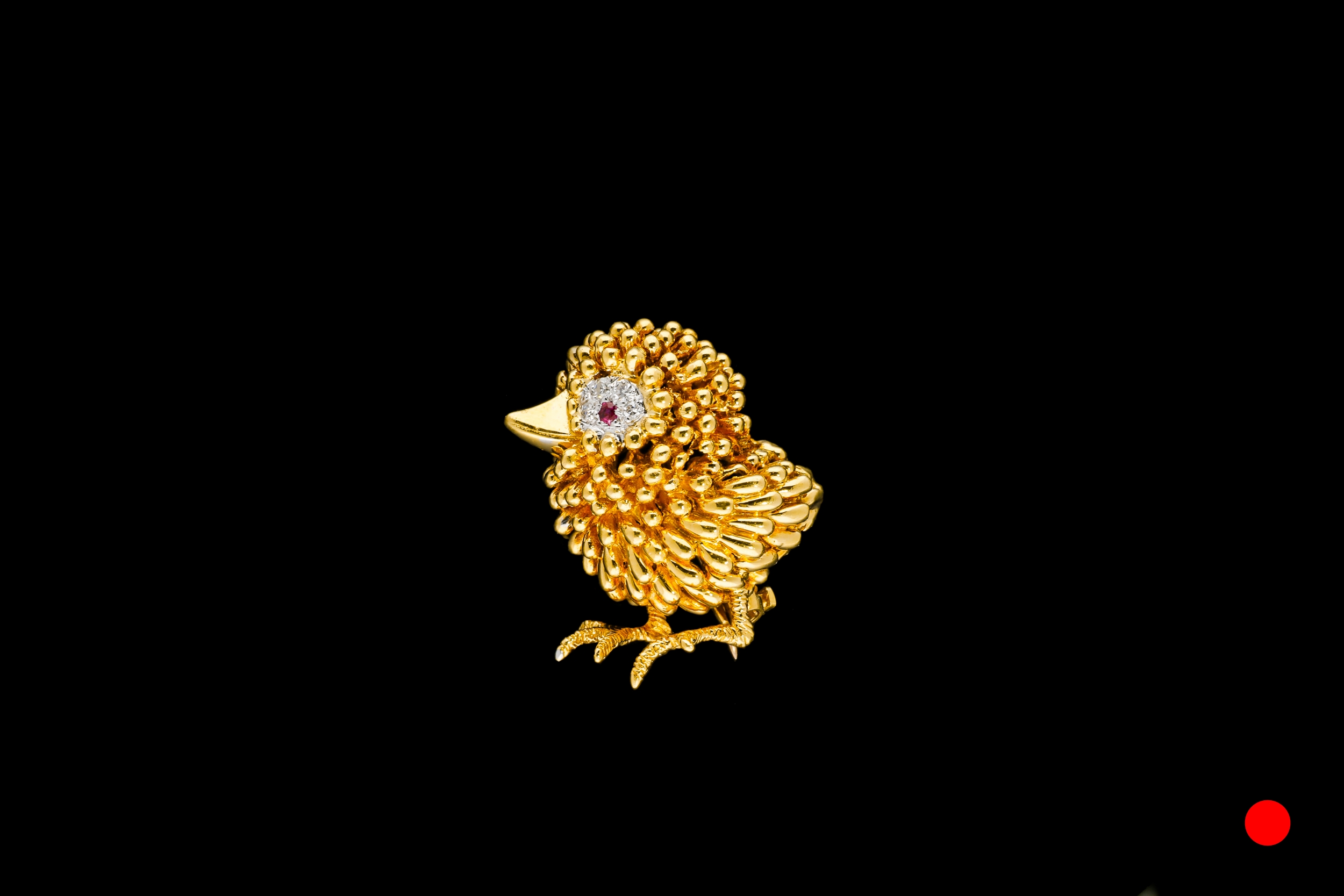 A gold 1950's Kutchinsky bird brooch | £3600