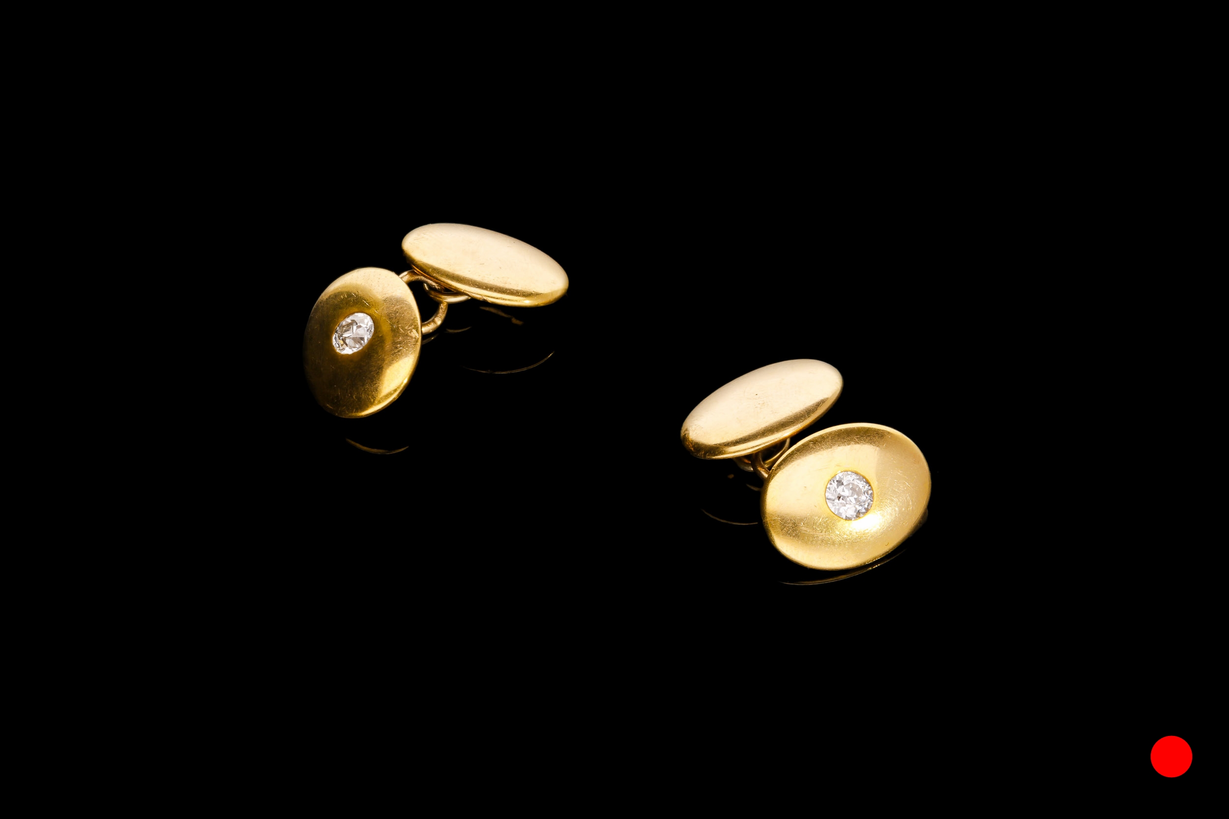 A 1930's 18ct domed oval cufflinks | £3450