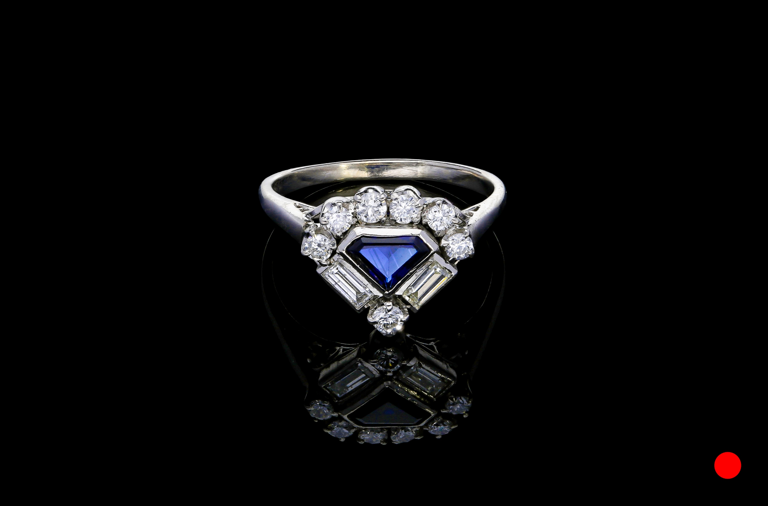 A 1950's 18ct shield ring | £2975