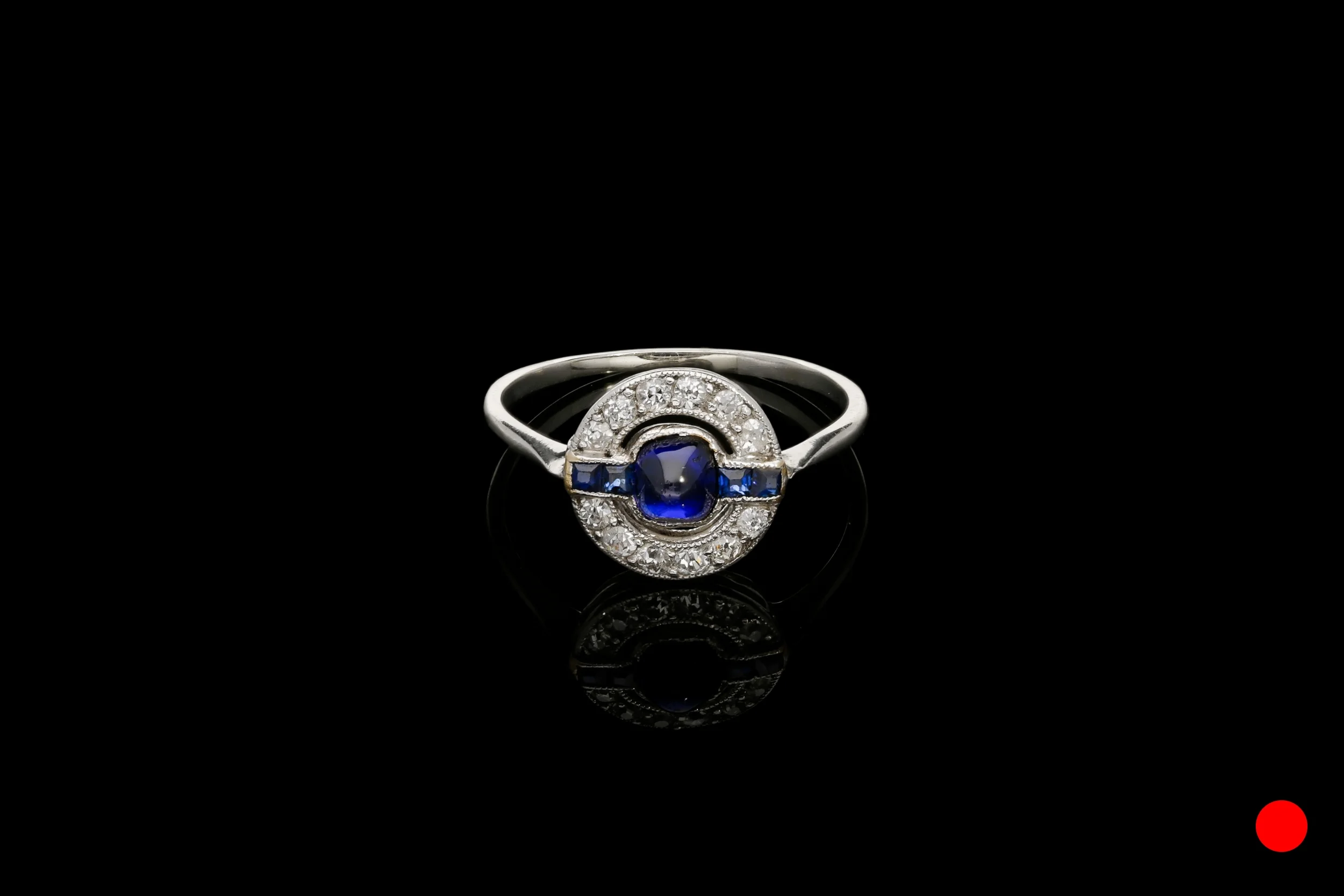 An Art Deco cabochon ring set | £2950
