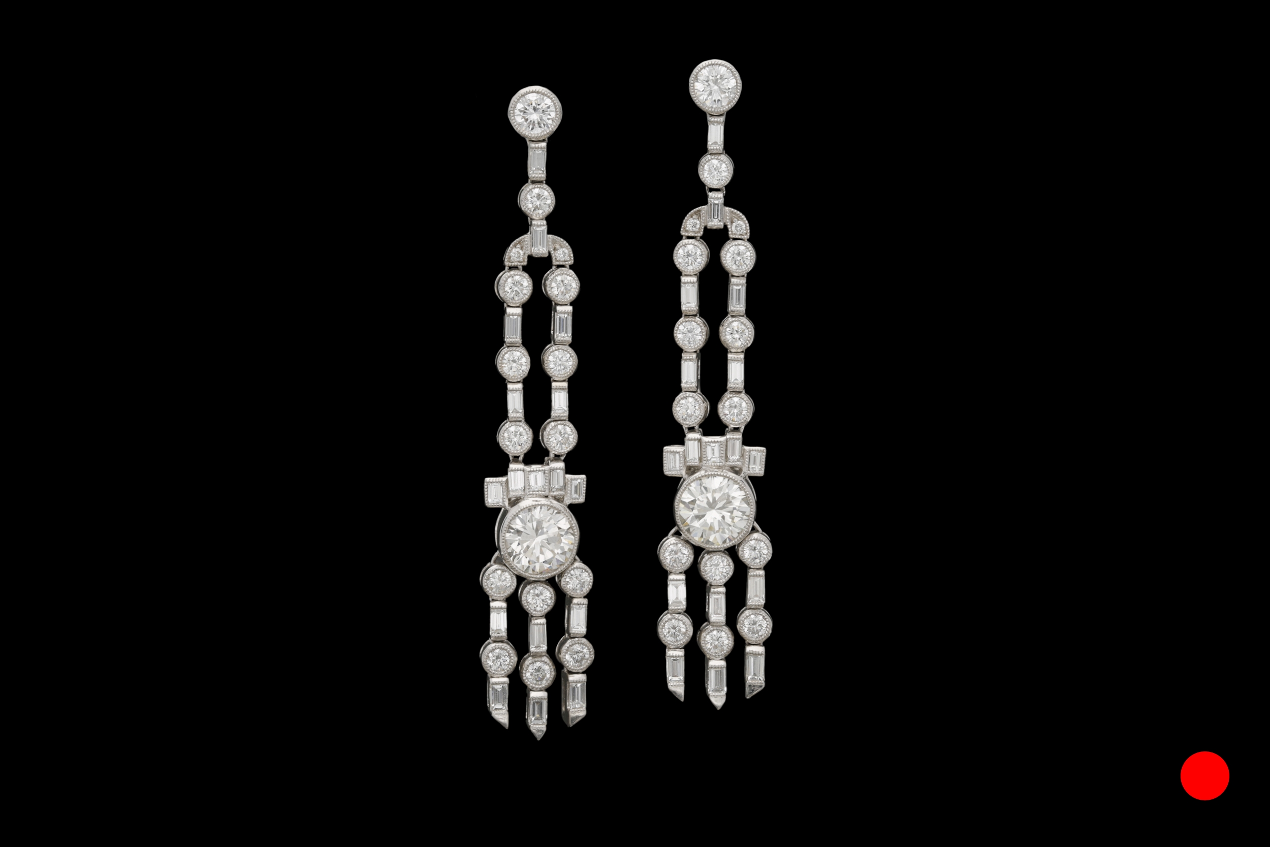 A stunning pair of iconic Art Deco platinum and diamond chandelier drop earrings | £19850