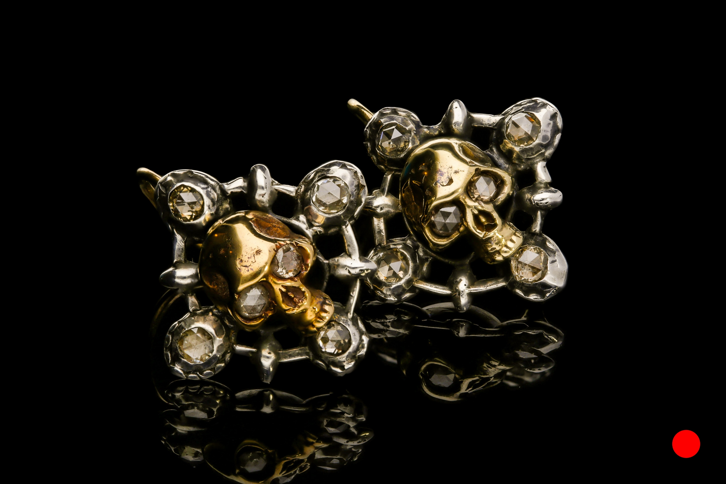 An unusual pair of momento mori Georgian gold and silver skull earrings set | £4800