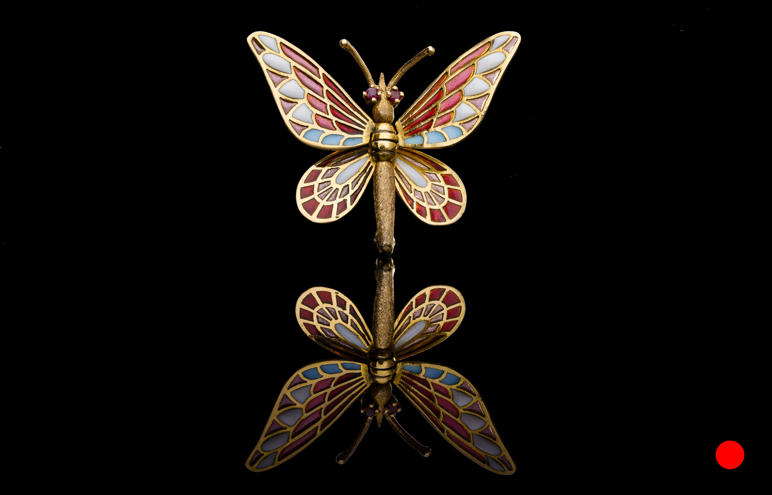 A 1950's plique-a-jour butterfly brooch | £2450