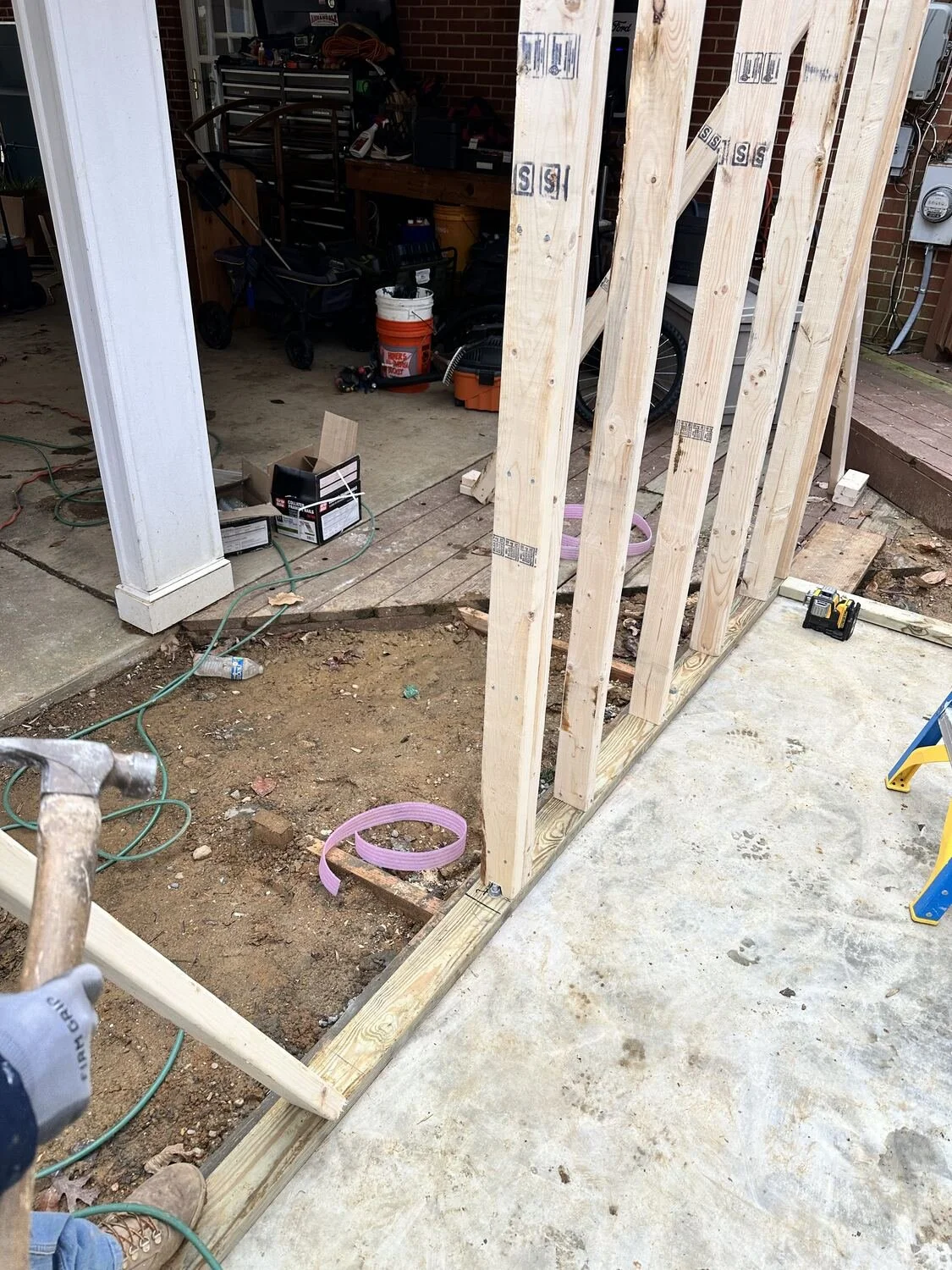 Framing the workshop addition behind the Annandale carport