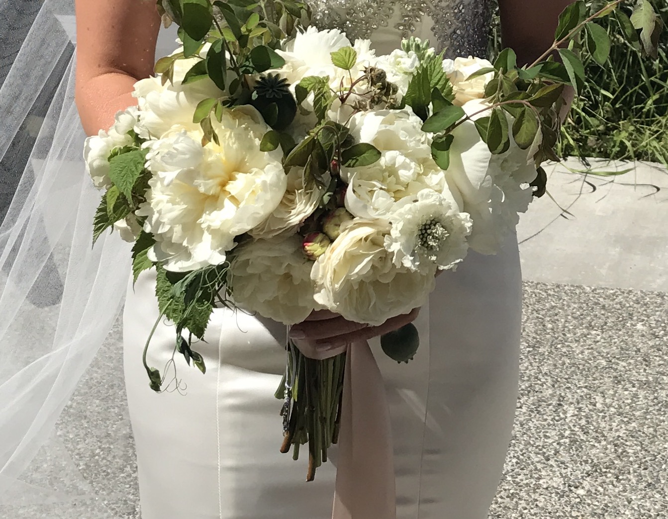 Heather & Joel's wedding was the first of two sister's to get married within two weeks of each other - that family had a busy few weeks but I know they loved every minute of it. The first wedding was on a very hot June day at the Marionfield Farm in Arlington, WA. Thankfully all of the flowers survived during the intense heat but apparently one of the unripened strawberries that was tucked away in the brides bouquet turned red by the end of the day! Photo Credit: David Cho Photography .