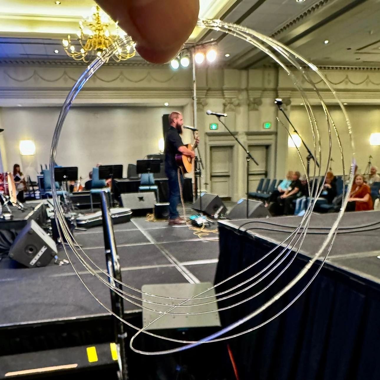 Cool picture of me at CAAS inside a broken nylon string found off stage! I had a great time. I'll be posting more soon! 

@chetsociety @rickybrasfield