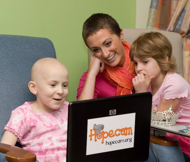 Former Miss Virginia Tara Wheeler with Hopecam child Shannon. Jae Yi Photography