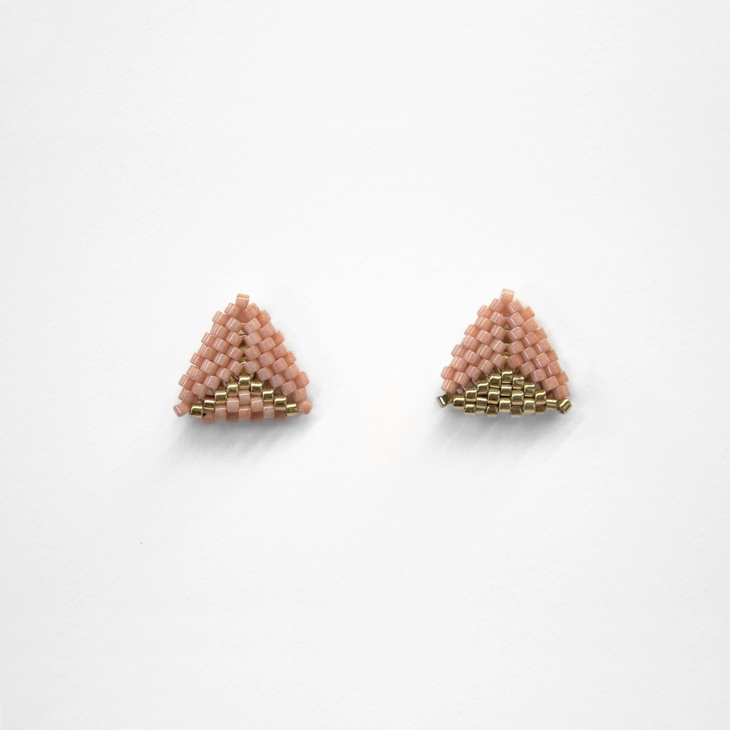 Rosa_Coral_Gold_BowandArrow.jpg