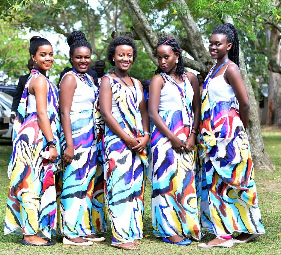 Too-Room, far right, with her friends working as ushers at a traditional Ugandan wedding. 