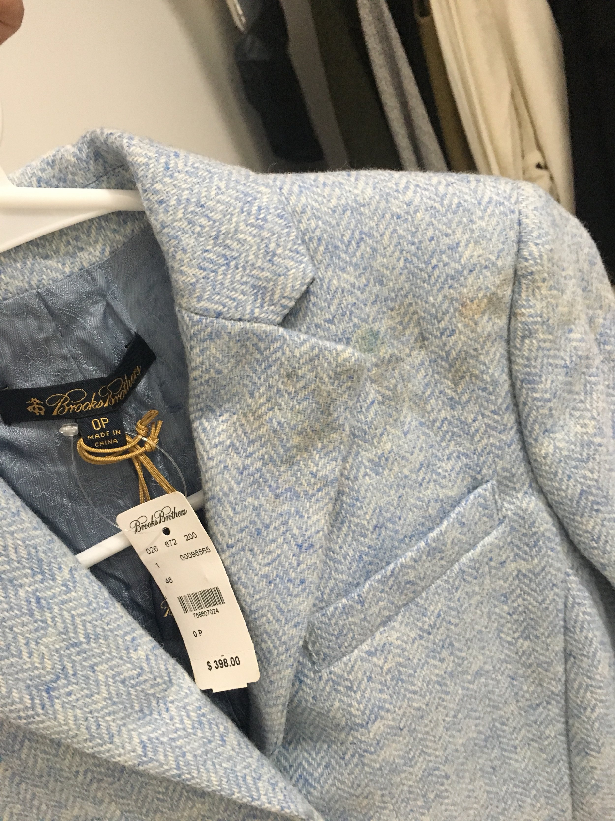 Lauren Pannell's Brooks Brothers blazer with damage.