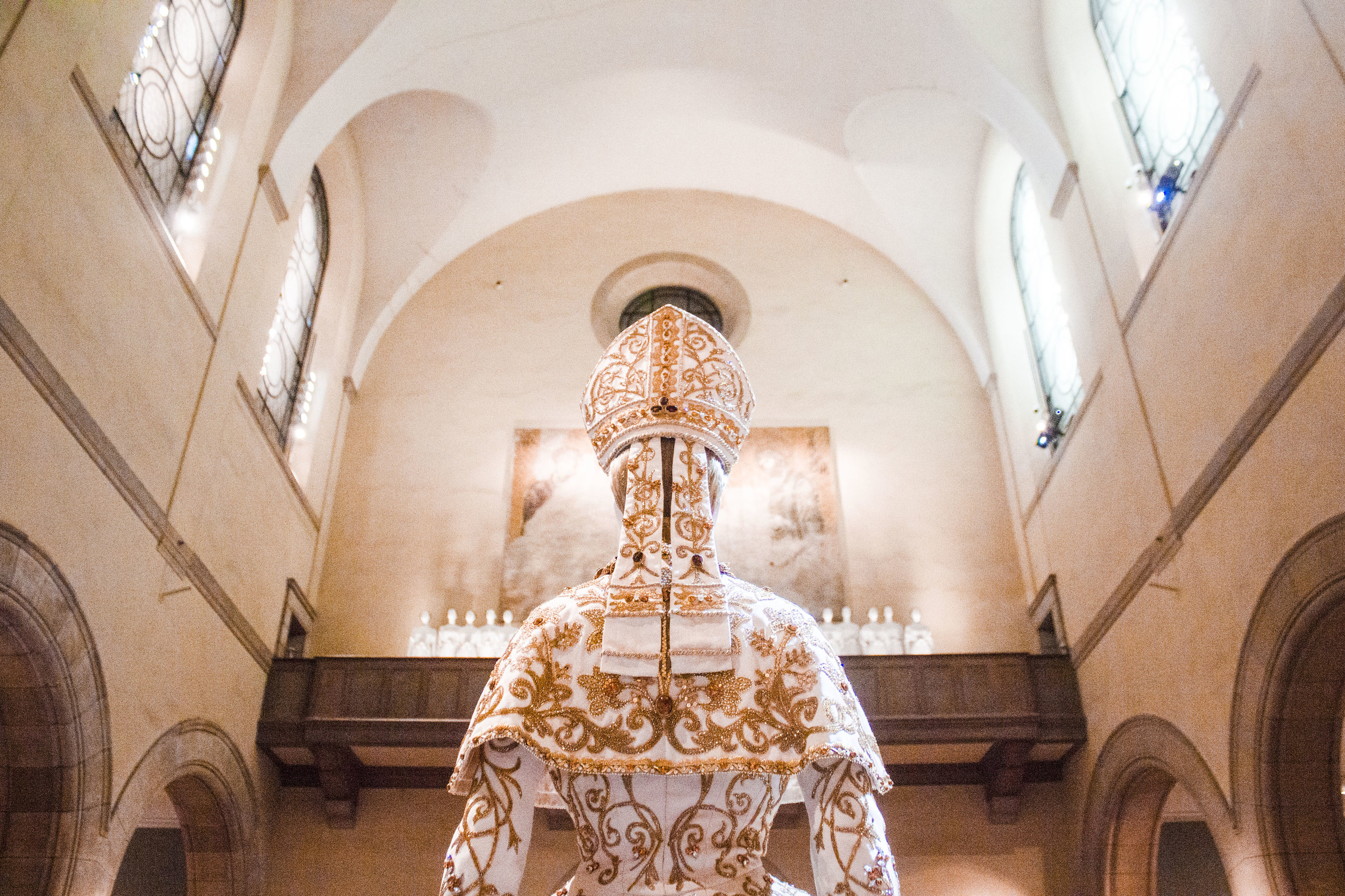 The John Galliano for House of Dior represents the pope in the hierarchal fashion show at the Metropolitan Museum of Art. || Photo credit: Bernadette Berdychowski