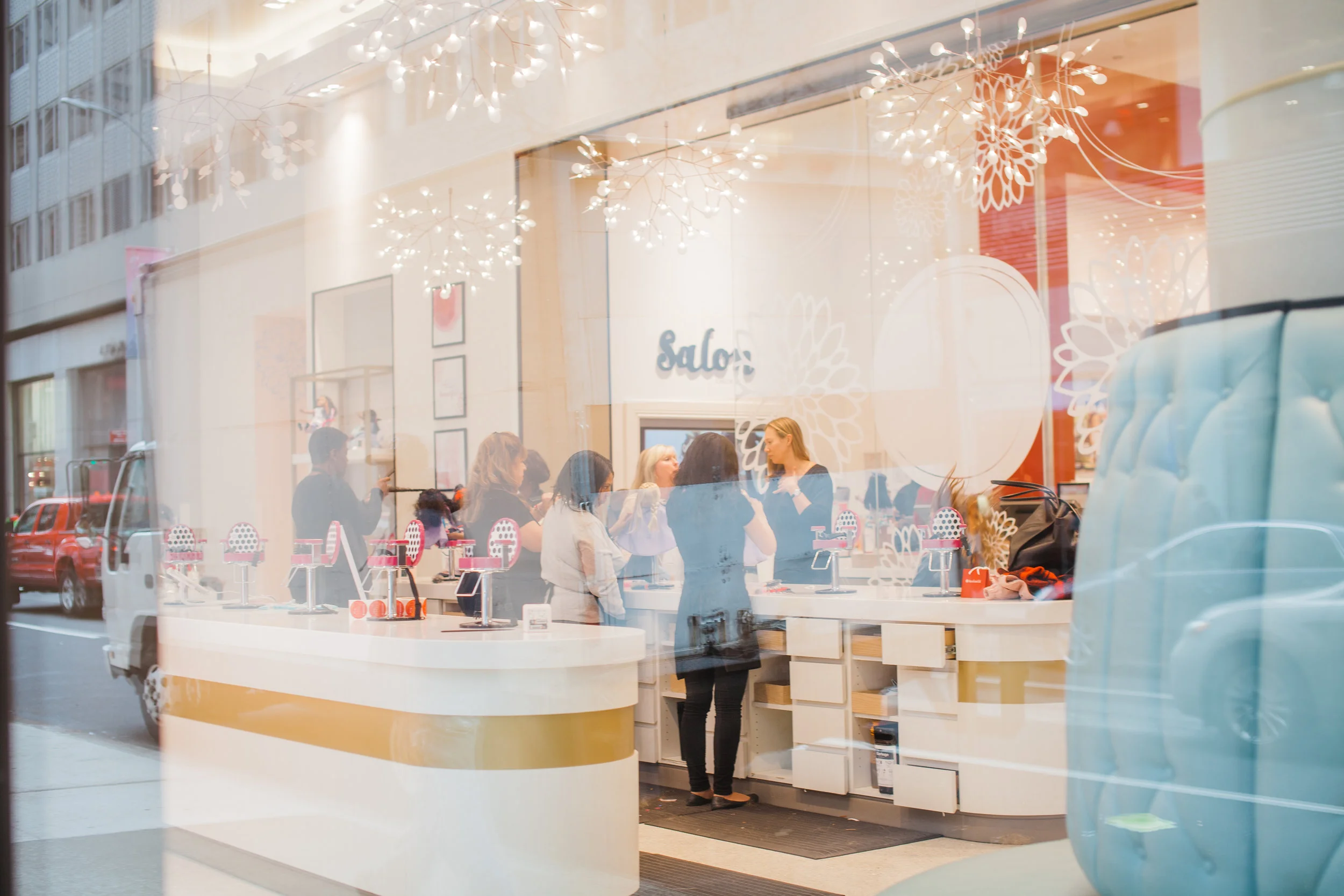 Girls bring their dolls to be pampered at the American Girl Salon. || Photo credit to Eli Esher