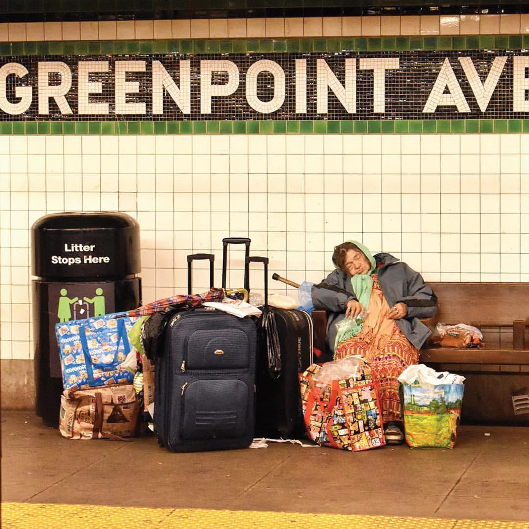 A homeless woman at the Greenpoint Ave. G train station in Brooklyn. || Photo credit to Jason Paris