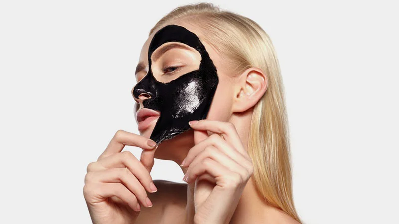 Activated charcoal face mask is used to reduce acne. I I Photo Credit to The Trend Spotter