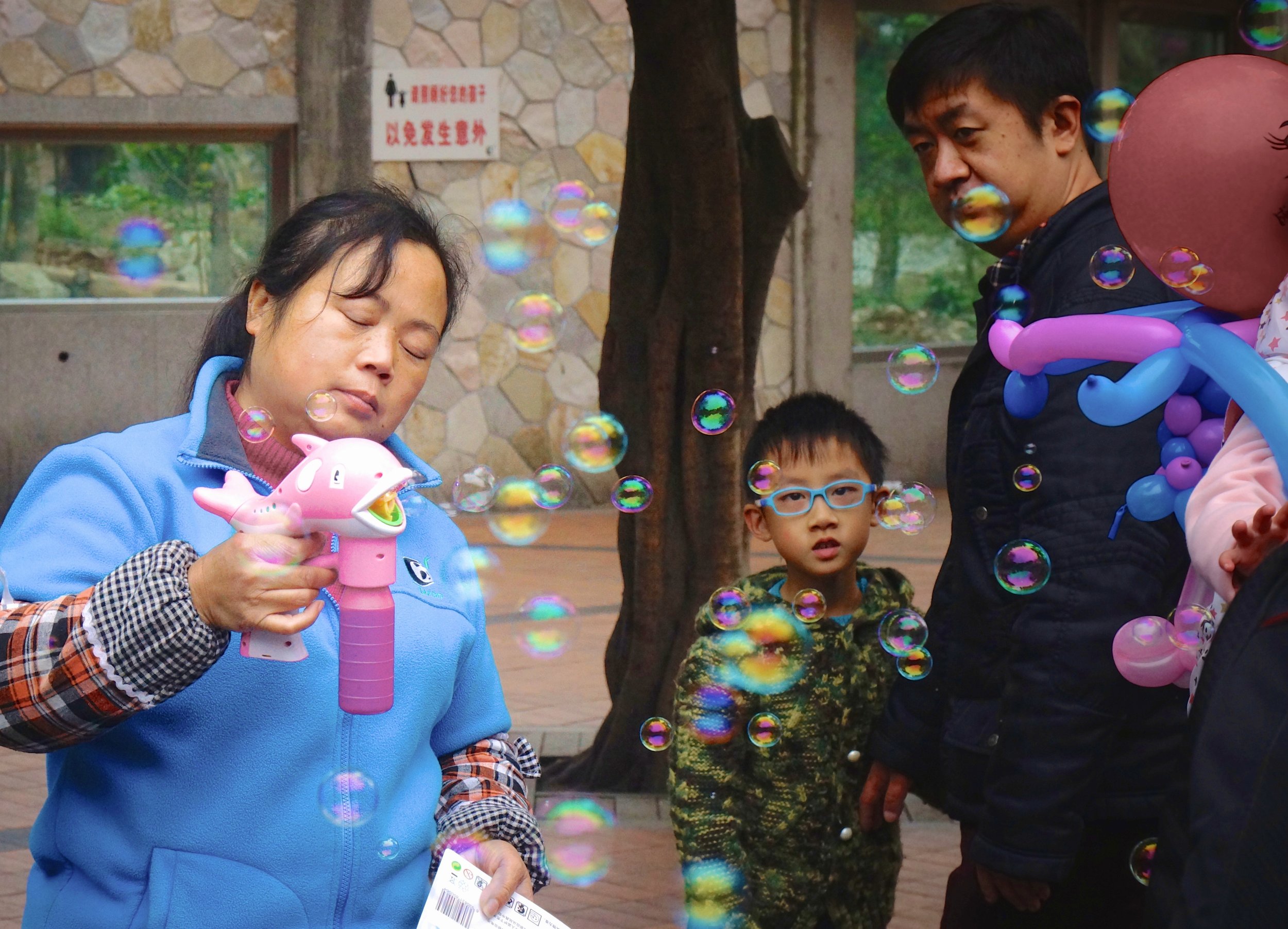 The Bubble Lady, Boy in Blue Glasses
