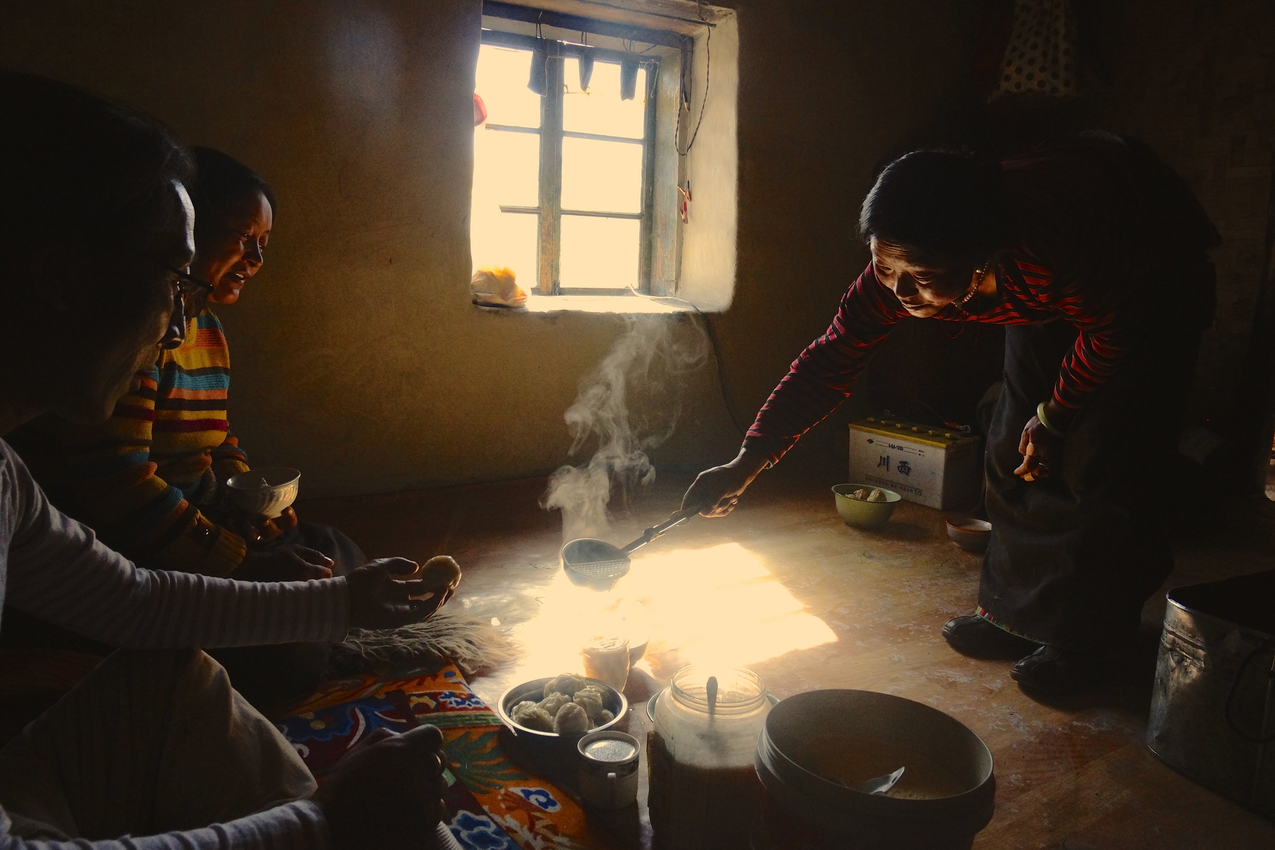 Tsezen serves butter tea