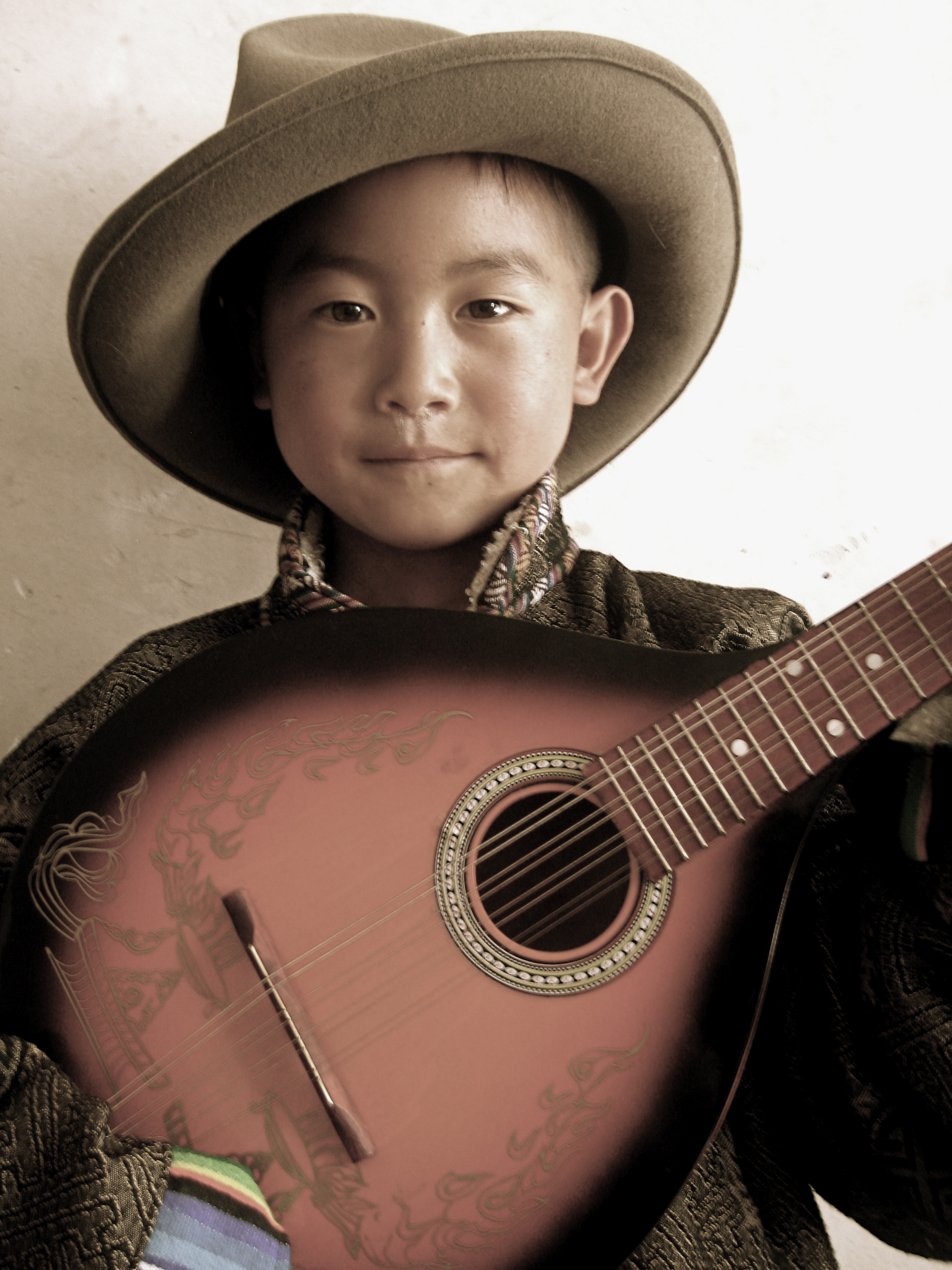 Boy with Mandolin and Uncle's Hat