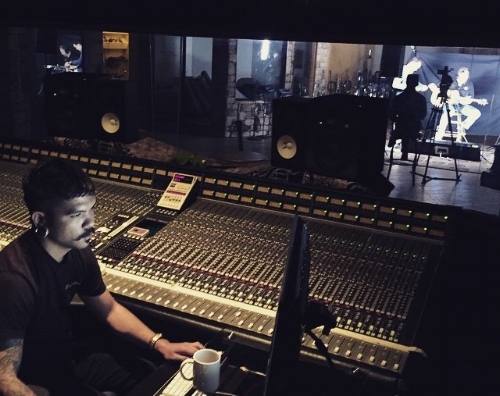 Daniel Bourget behind the SSL console in Studio A