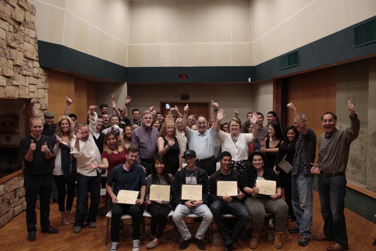 Graduates surrounded by family, friends, and Studio West and The Recording Arts Center staff. Mark Kirchner (far right in photo), former Chief Academic Officer, flew down from the Bay Area for the event.