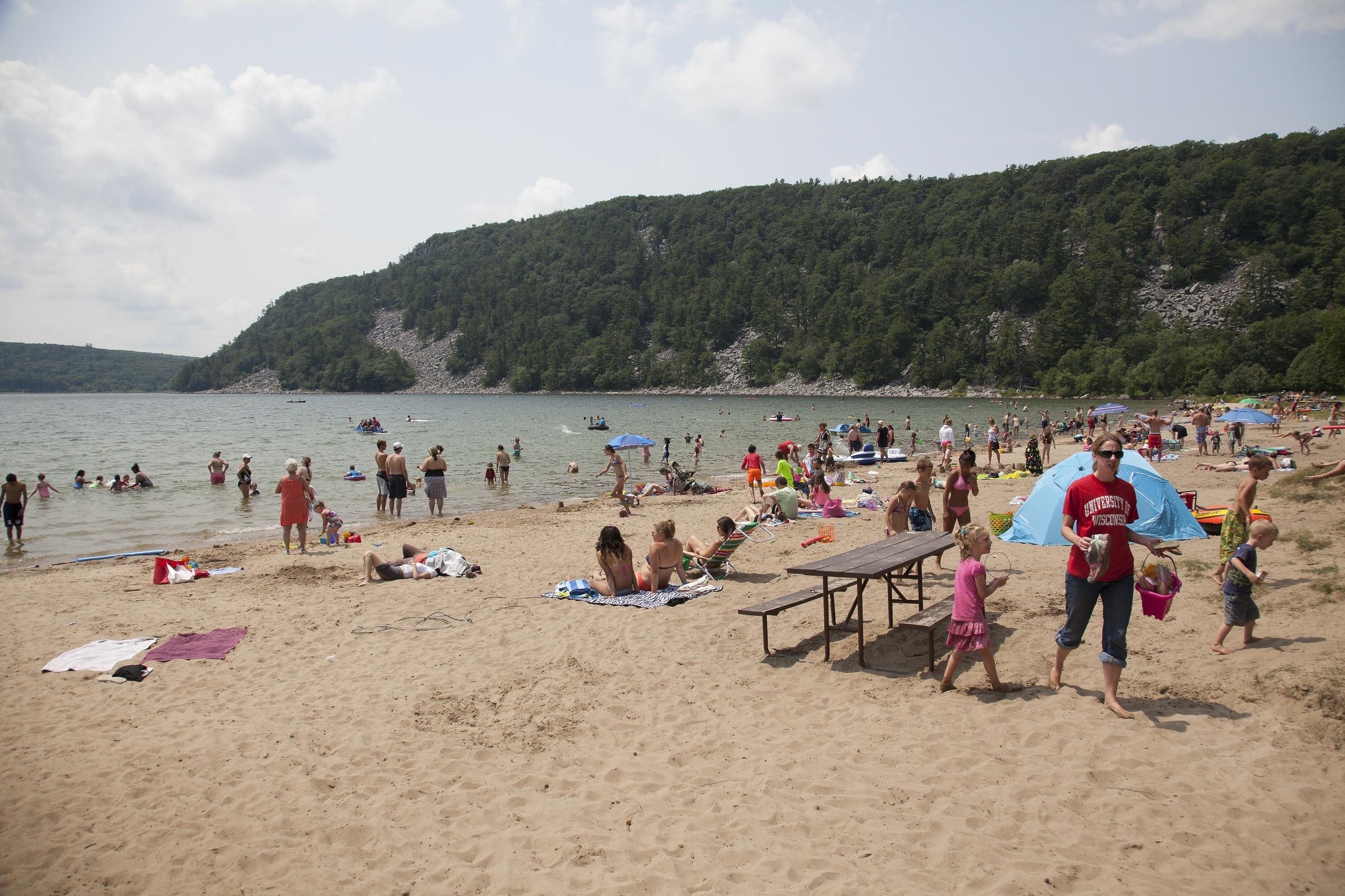 The sandy beaches are a main attraction on sunny days at Devils Lake State Park.