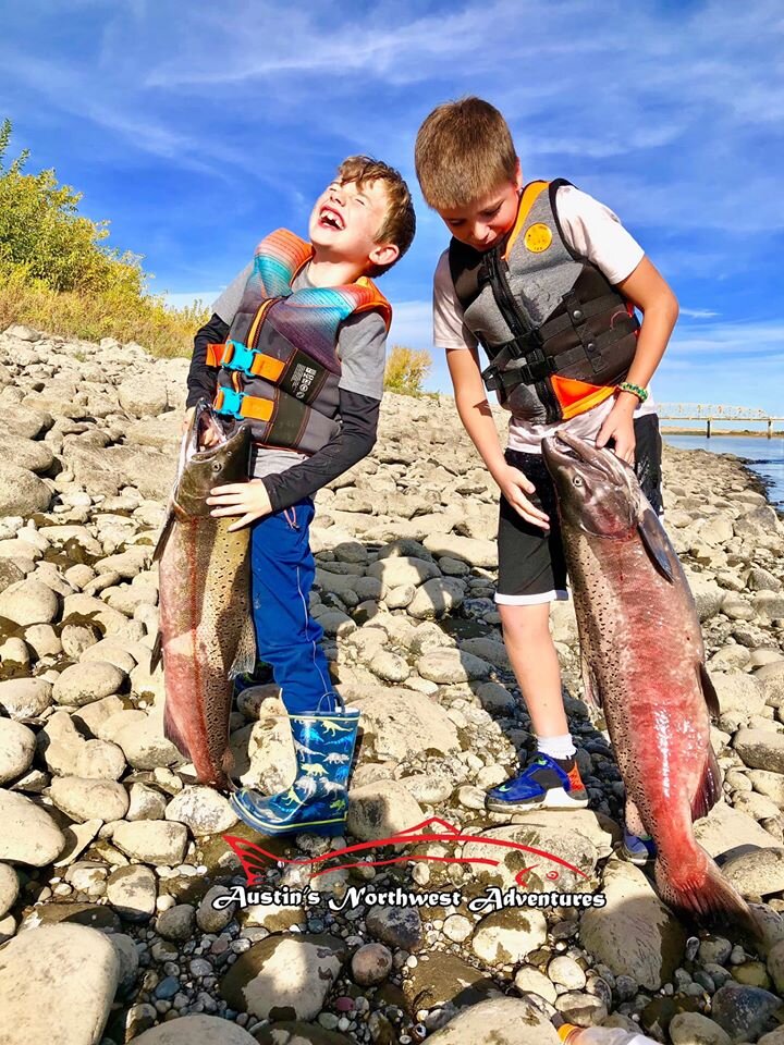 young boys with red dragon salmon austins northwest adventures.jpg