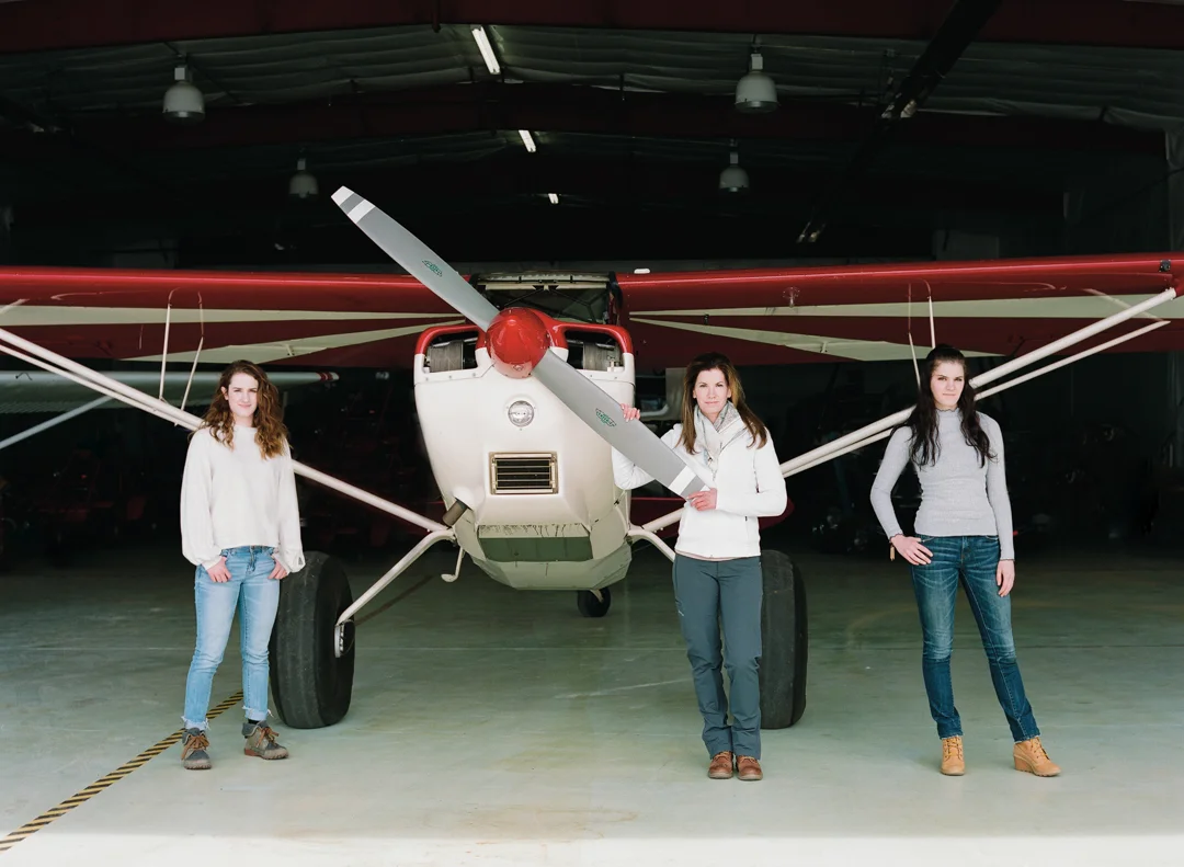 Lori Olson with her twin daughters, who were one of her biggest motivators for Lori to pursue her dream to fly.