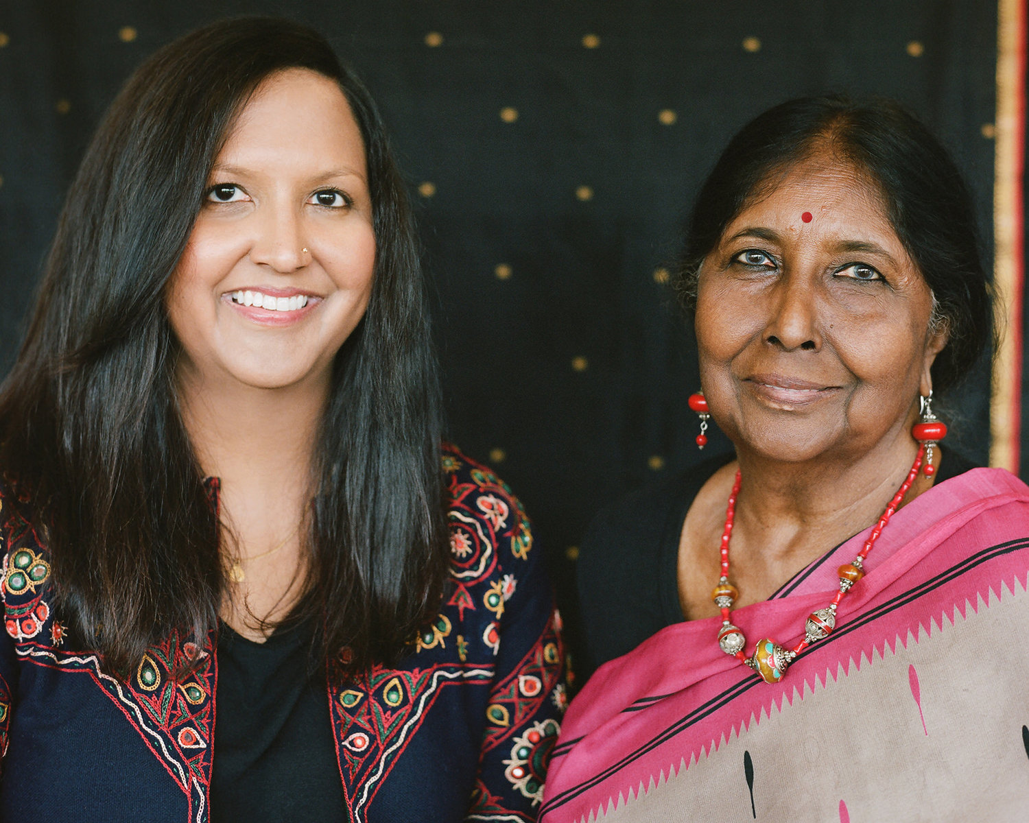 Nimi+and+Nina+McConigley+-+Women+in+Wyoming+Podcast+-+Black+Backdrop+Portrait+Studio.jpg