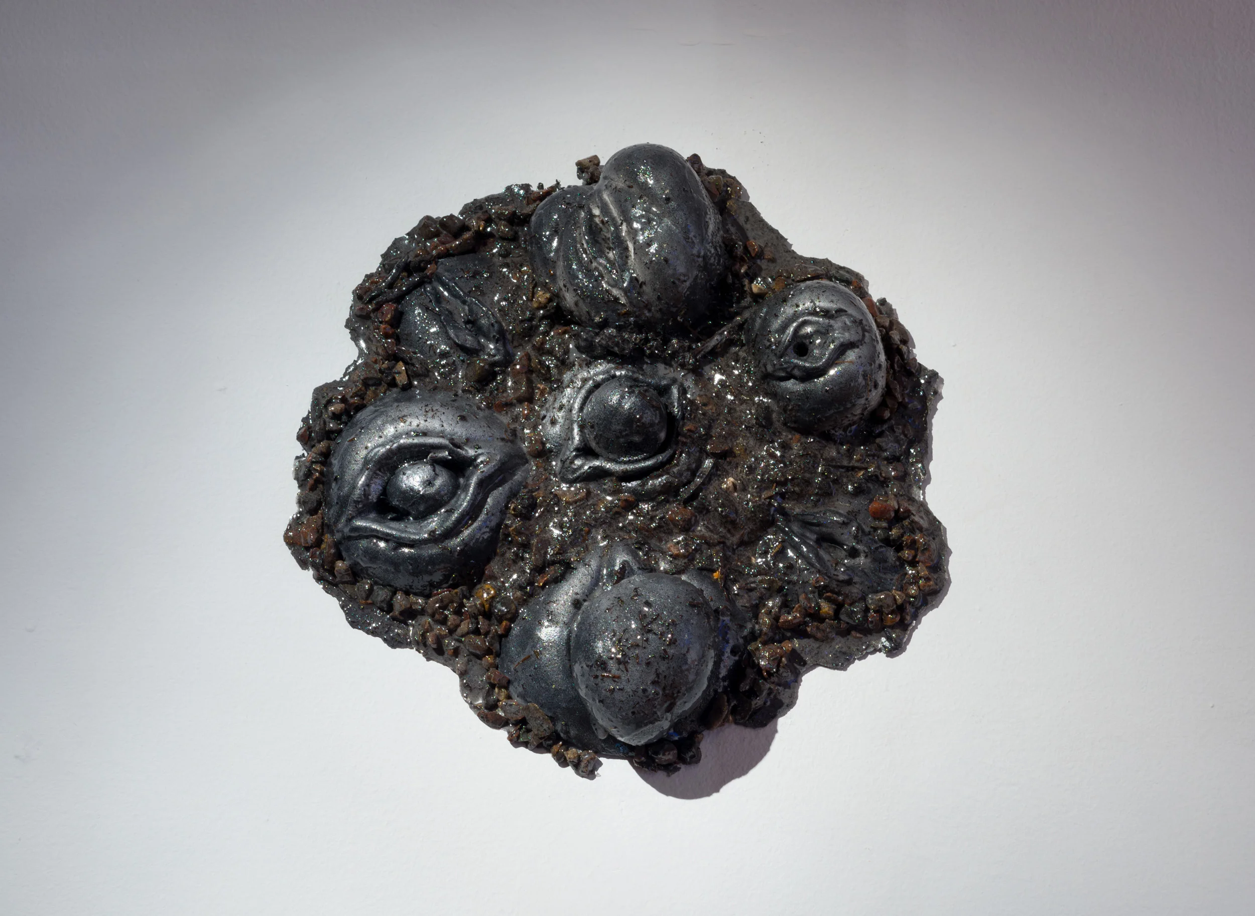 Vaginis Wreath , 2017 Cold-cast aluminum, resin, soil, rocks 10 ½ x 11 x 2 ½ inches