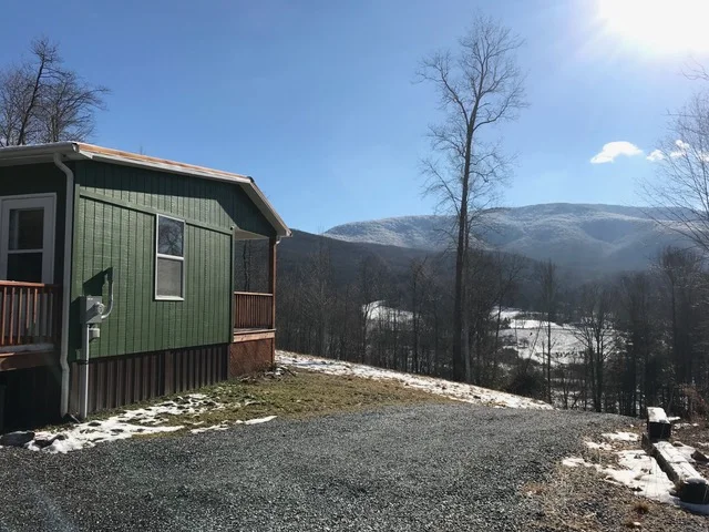 winter sun and cabin.jpeg