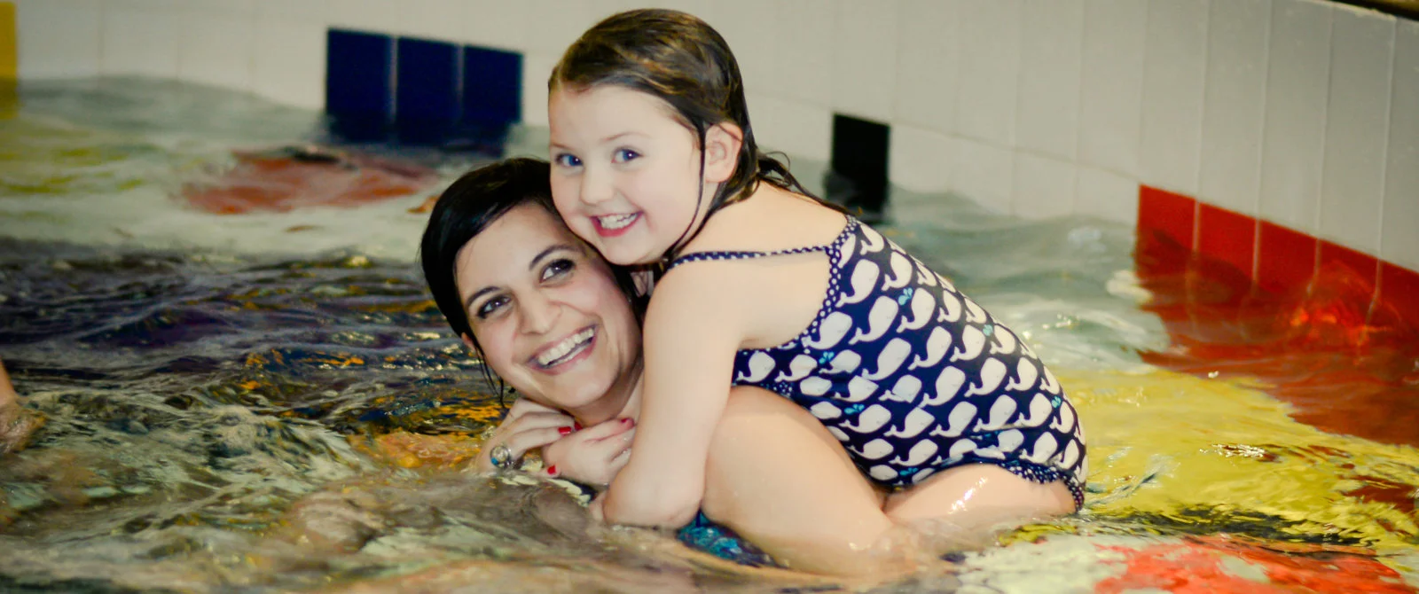 Mother and daughter enjoying Osprey swimming pool facilities