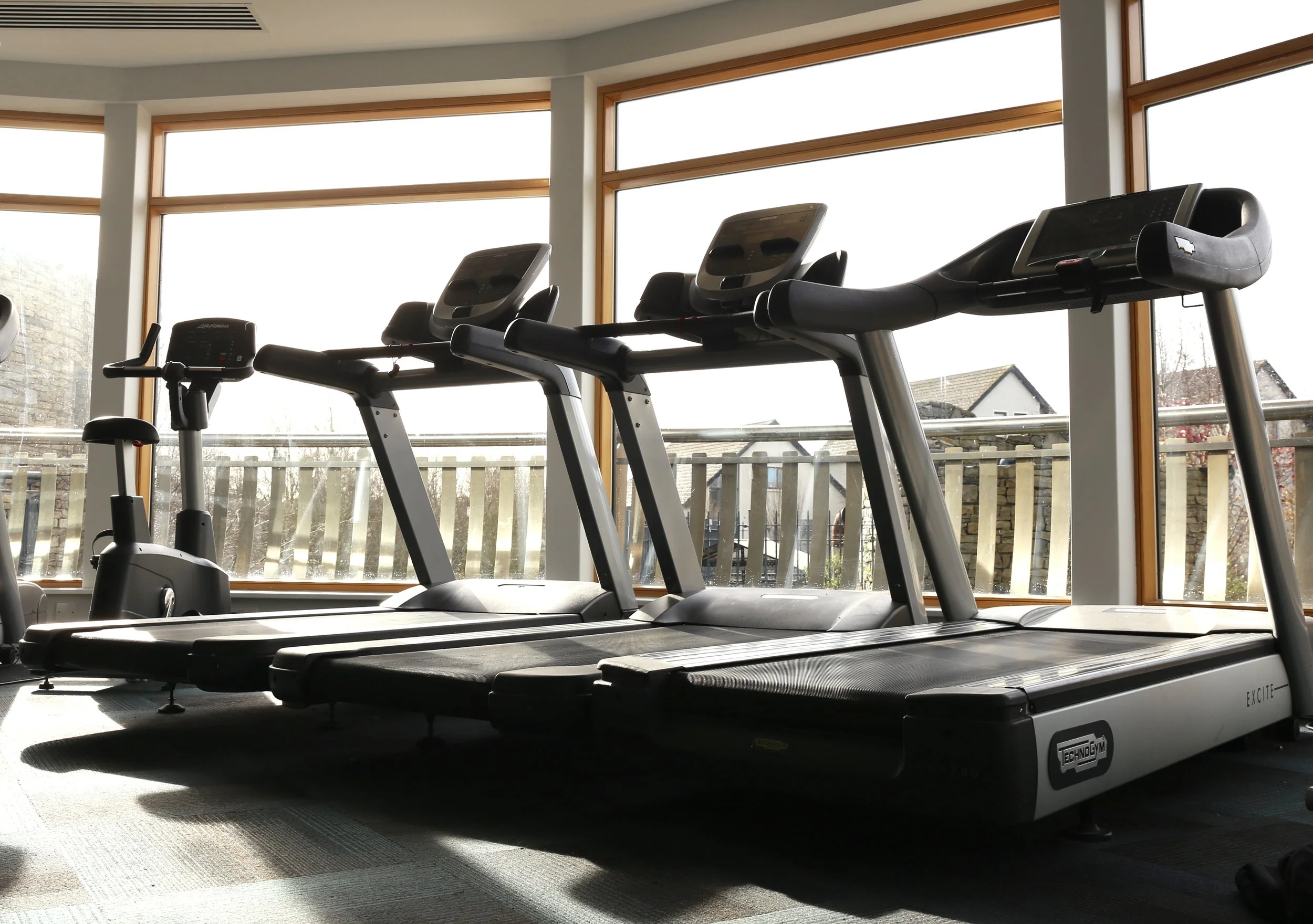 Osprey Hotel Gym long angle of Treadmills.jpeg