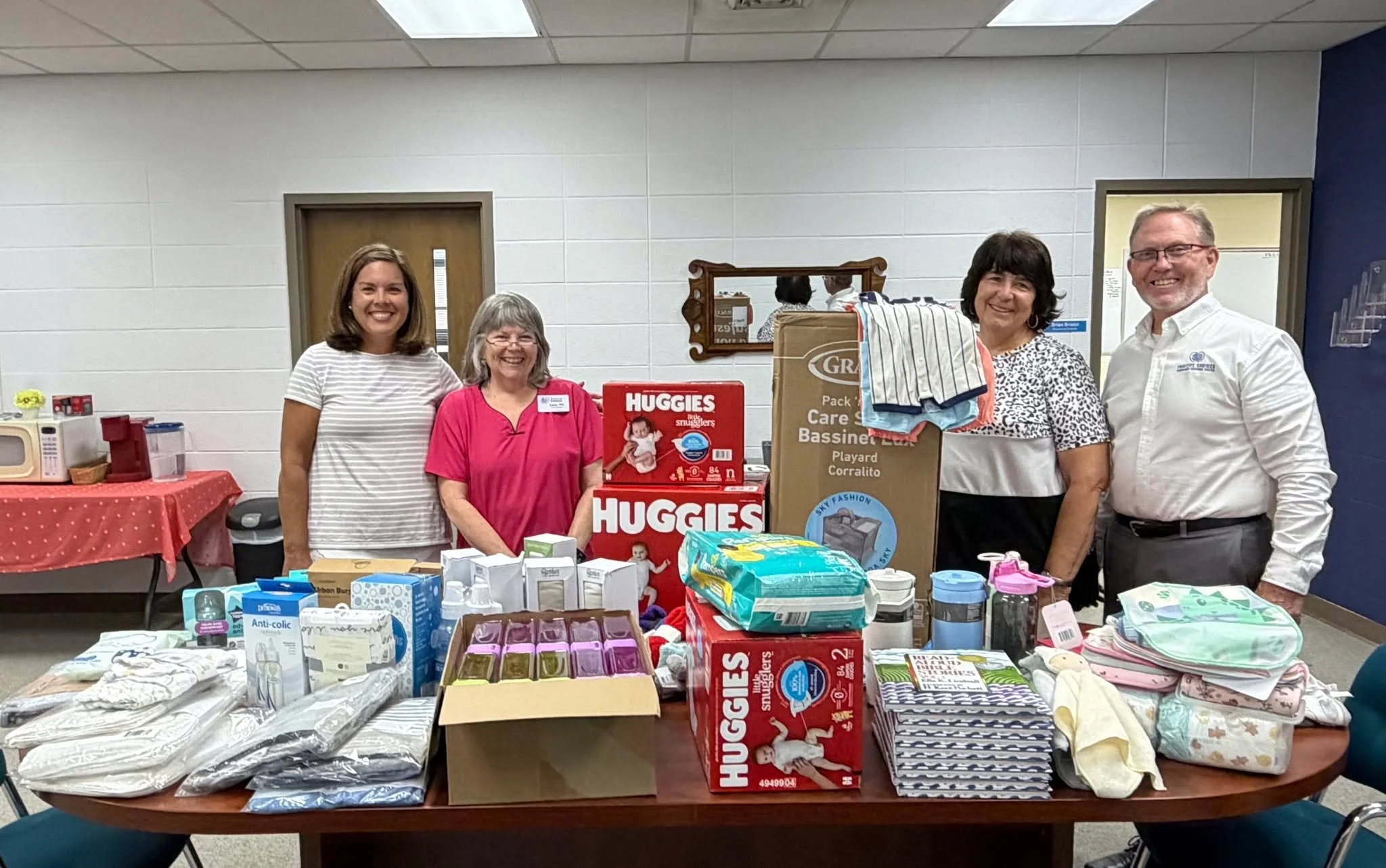 Leigh Glenn was delighted to be able to make a big delivery to Positive Choices Pregnancy Center in Centerpoint yesterday with all the gifts and donations from your contributions to the World's Largest Baby Shower in partnership with Anglicans for Li