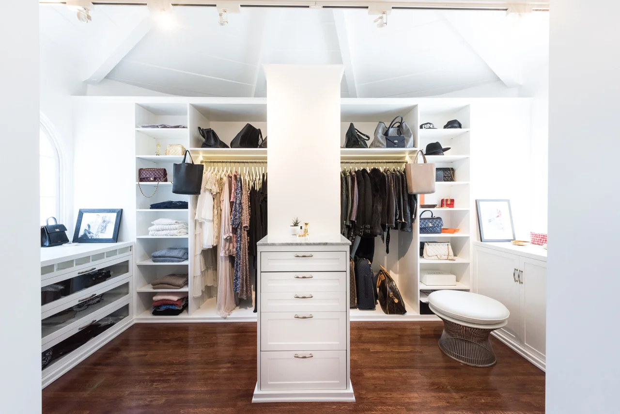 WHAT KIND OF HANGERS DO YOU USE? "Simply white wood ones with the ANINE BING logo, same as we have in our stores." 