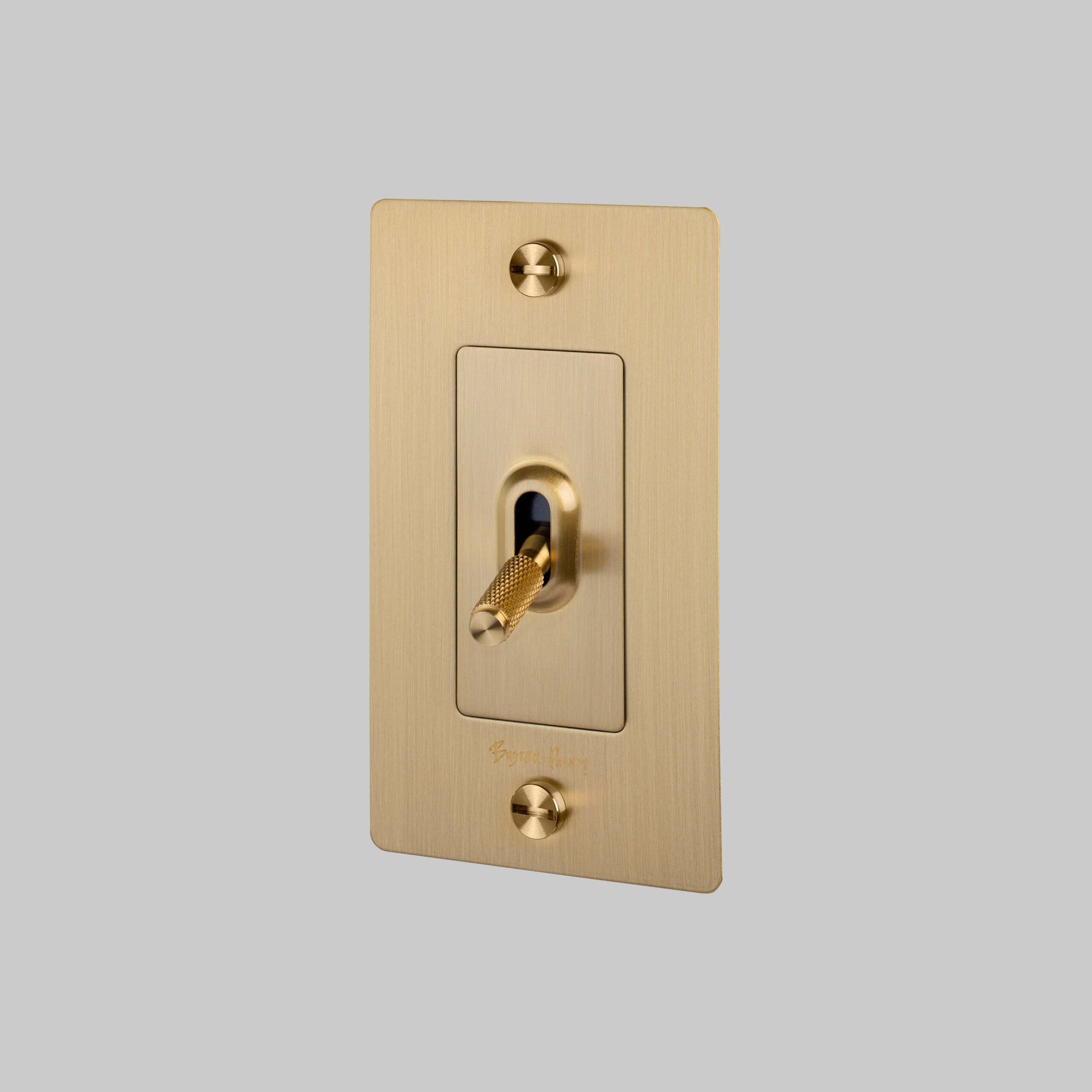 1.-BusterPunch_US_1G_Toggle_Brass_Side-scaled.jpg