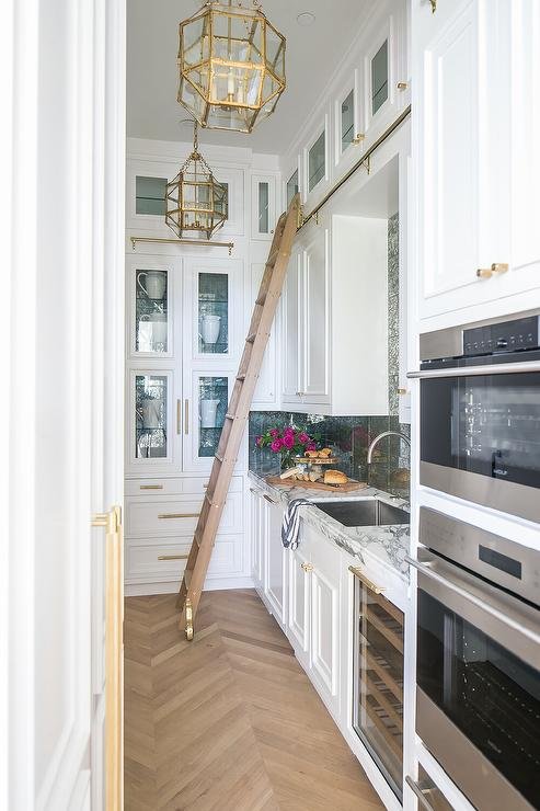kitchen-pantry-rolling-ladder-on-brass-rails.jpg