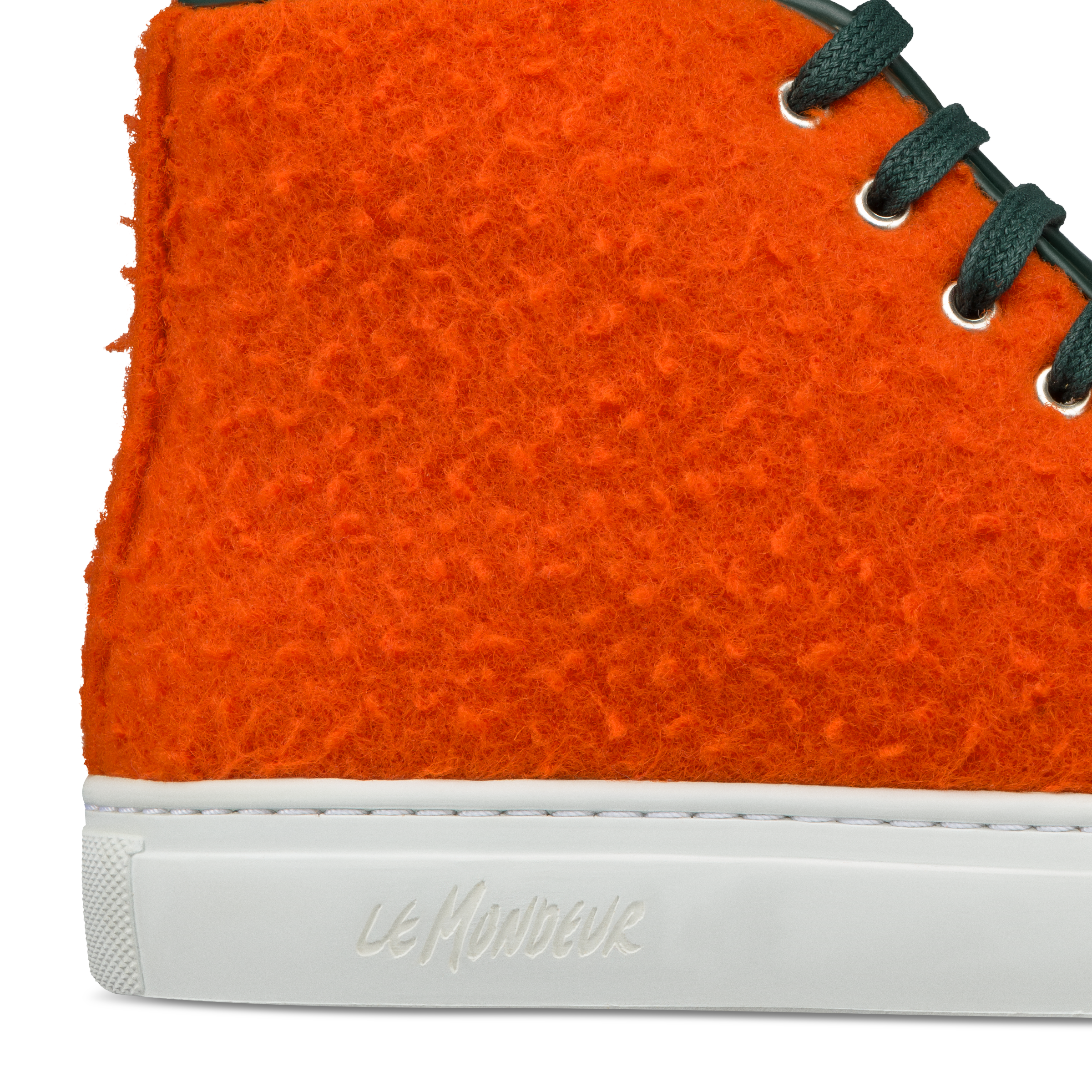 Orange wool sneaker handmade in Portugal with artisan textiles from Italy