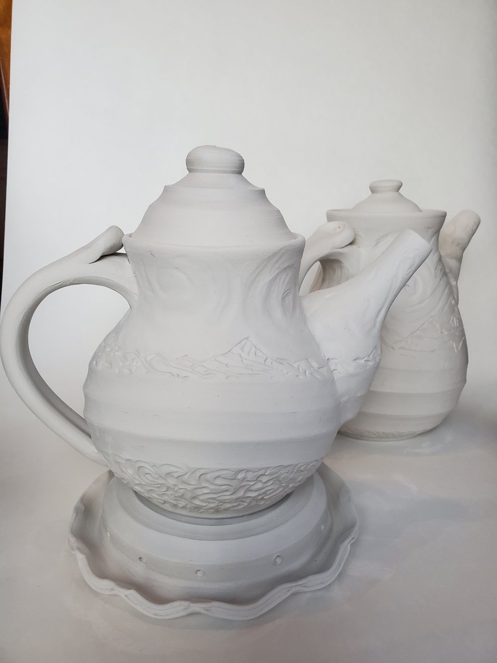 Two Earthenware Teapots