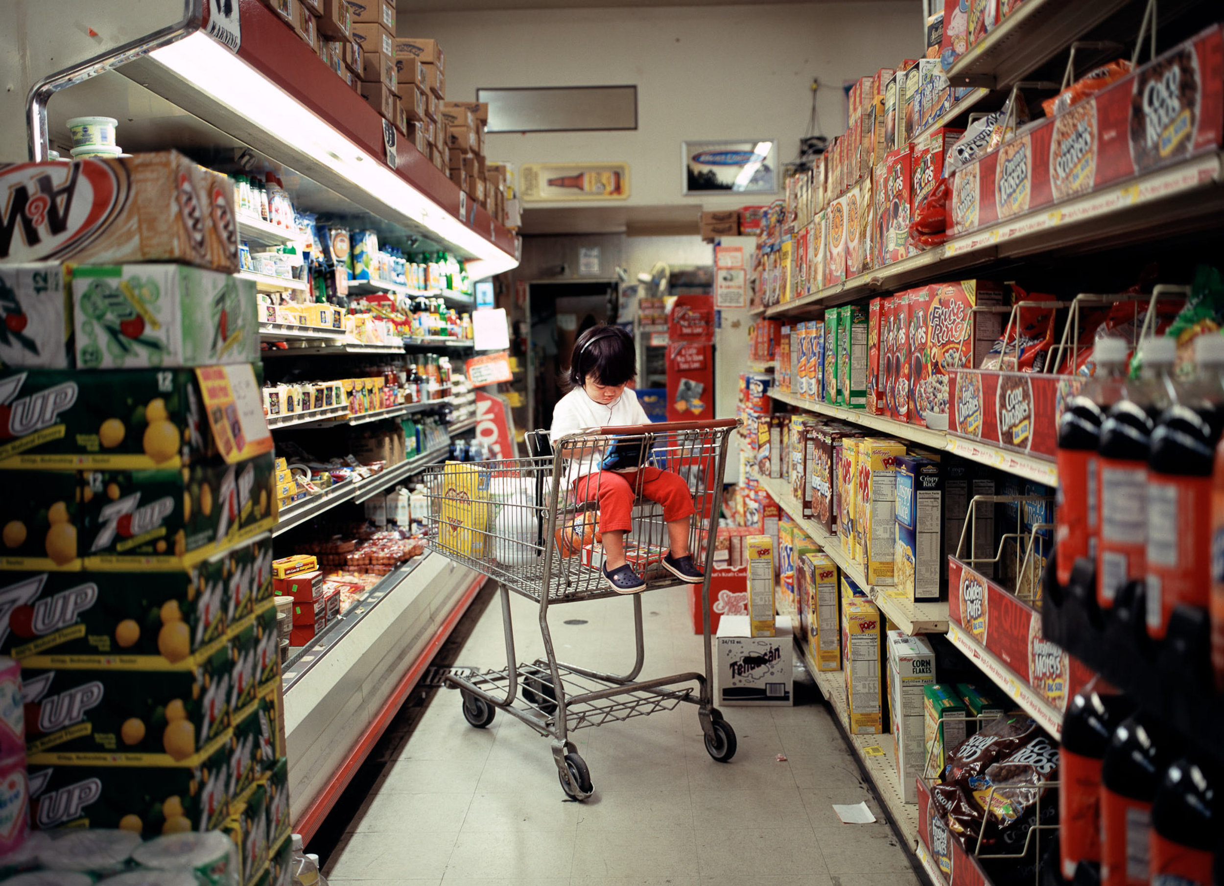   Dioramas is a series of staged photographs recreated from memories of moments I’ve observed in my daily life. I photographed these scenes from a voyeur’s perspective, simulating the quality of a traditional, “caught moment” documentary photograph. 